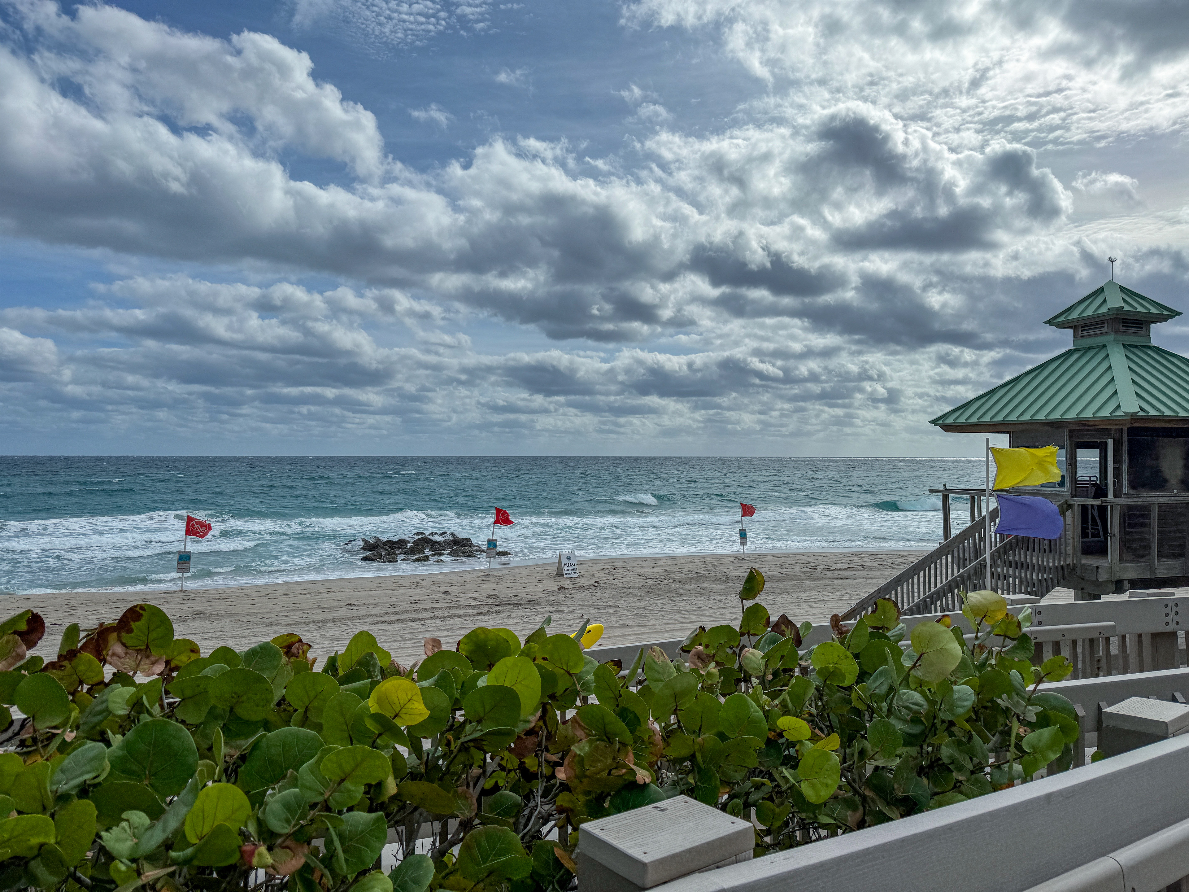 Storm brewing over the Atlantic Ocean-Windy and cloudy beach scene.