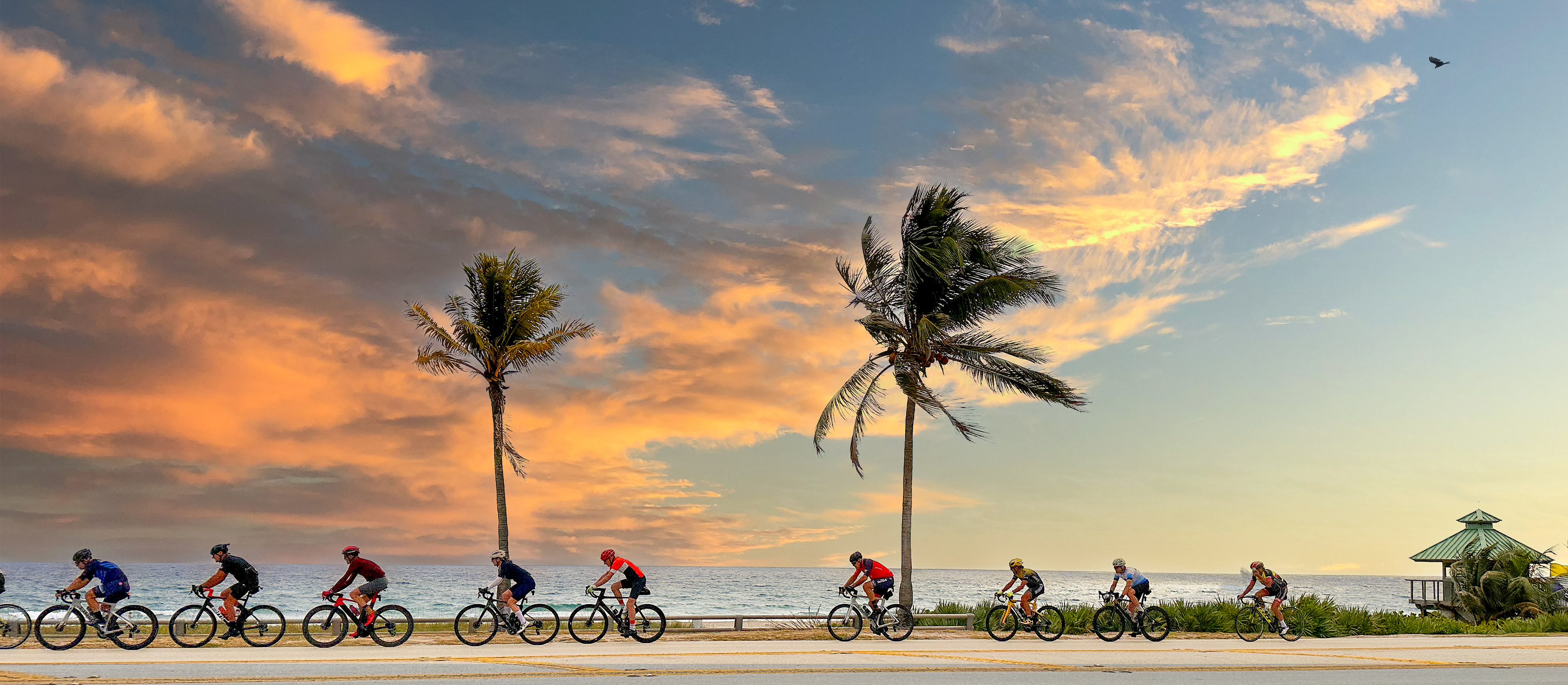 Peloton traveling north at sunrise on Ocean Boulevard in Boca Raton, Florida.