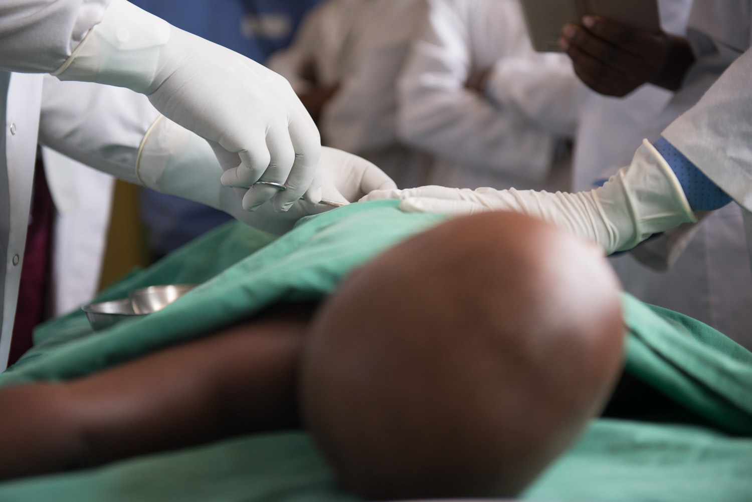 Performing surgery at Chahi Hospital, DRC