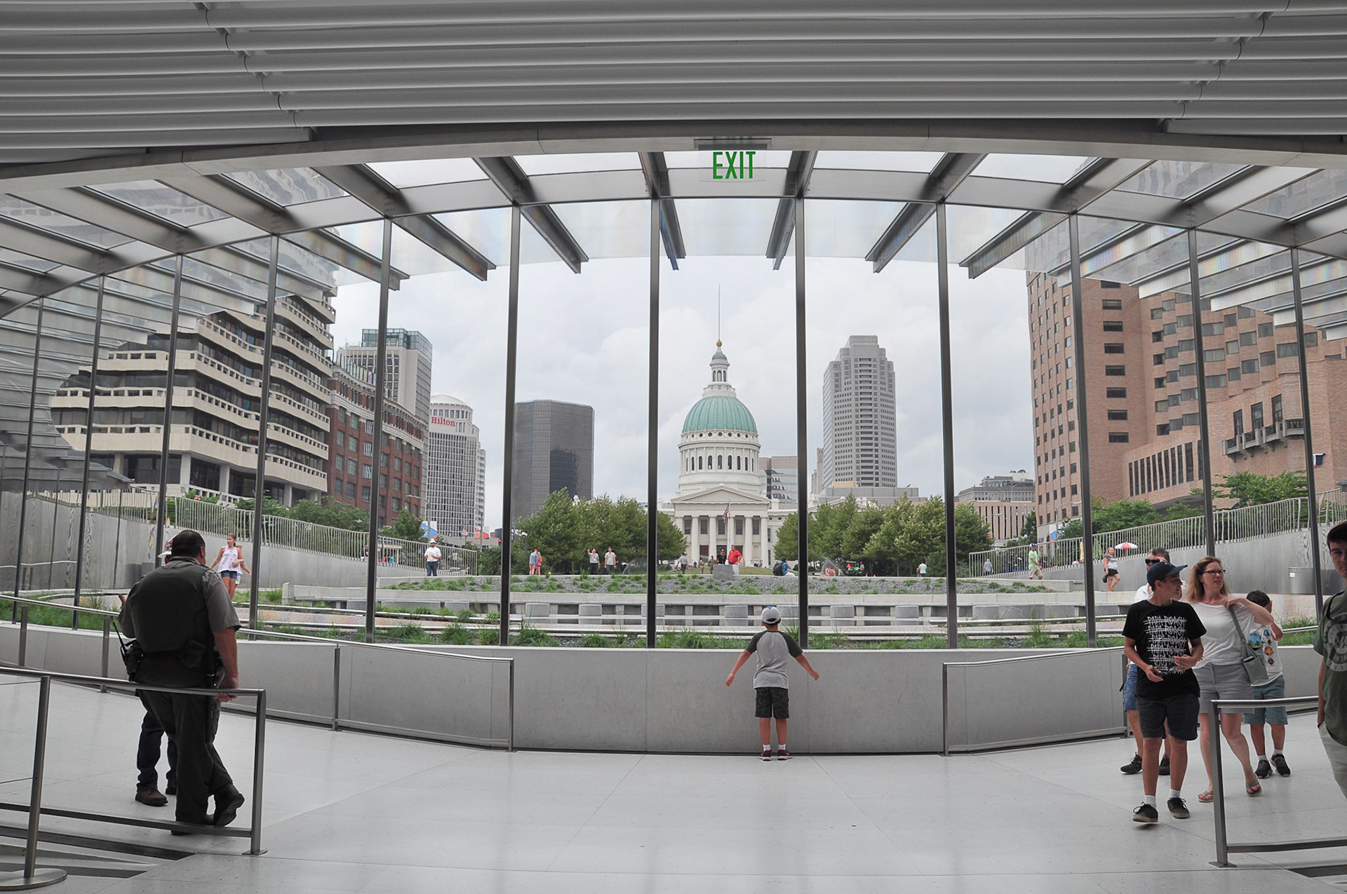 A boy stands still to take in the capitol building