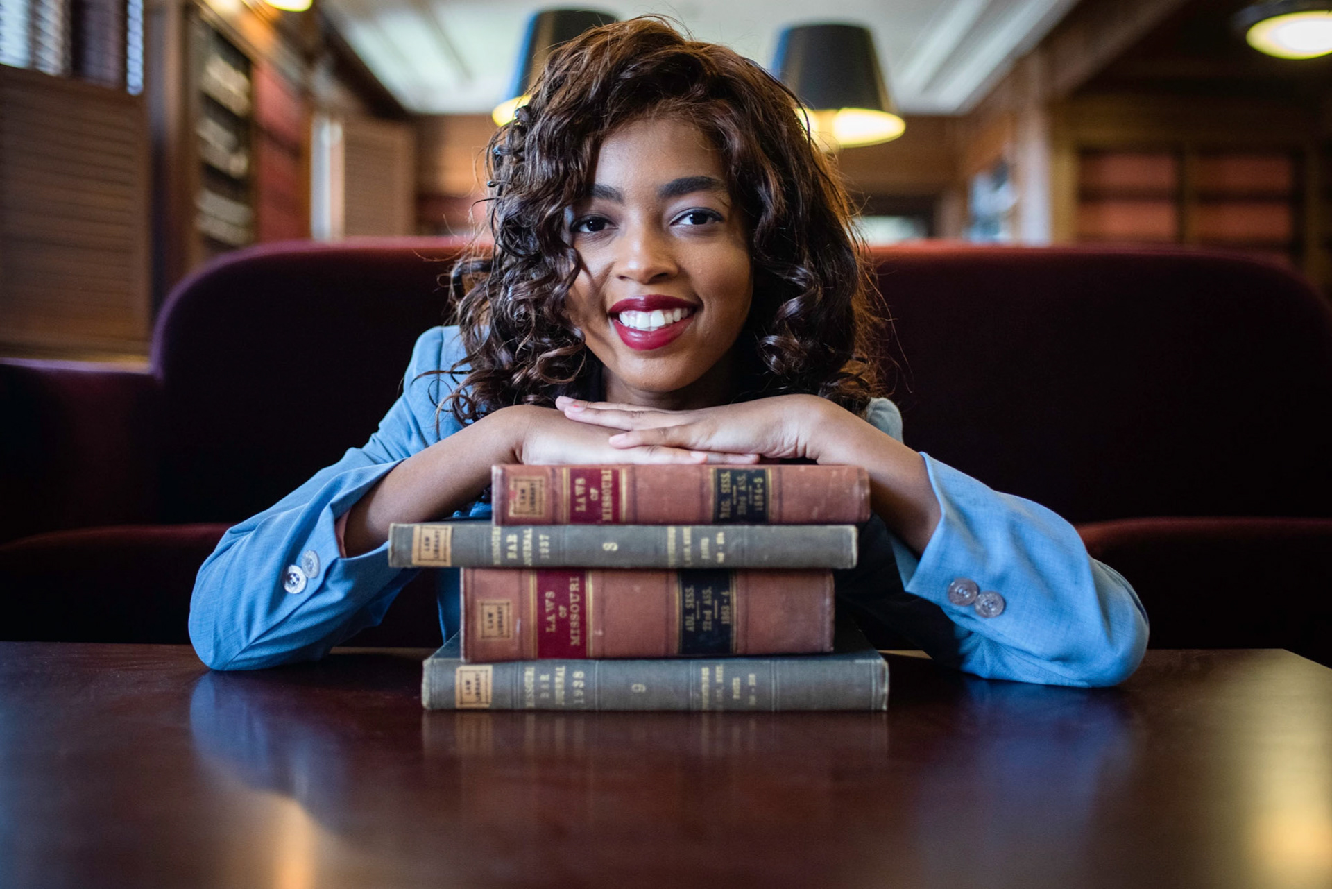 high school senior girl pre-law in law library