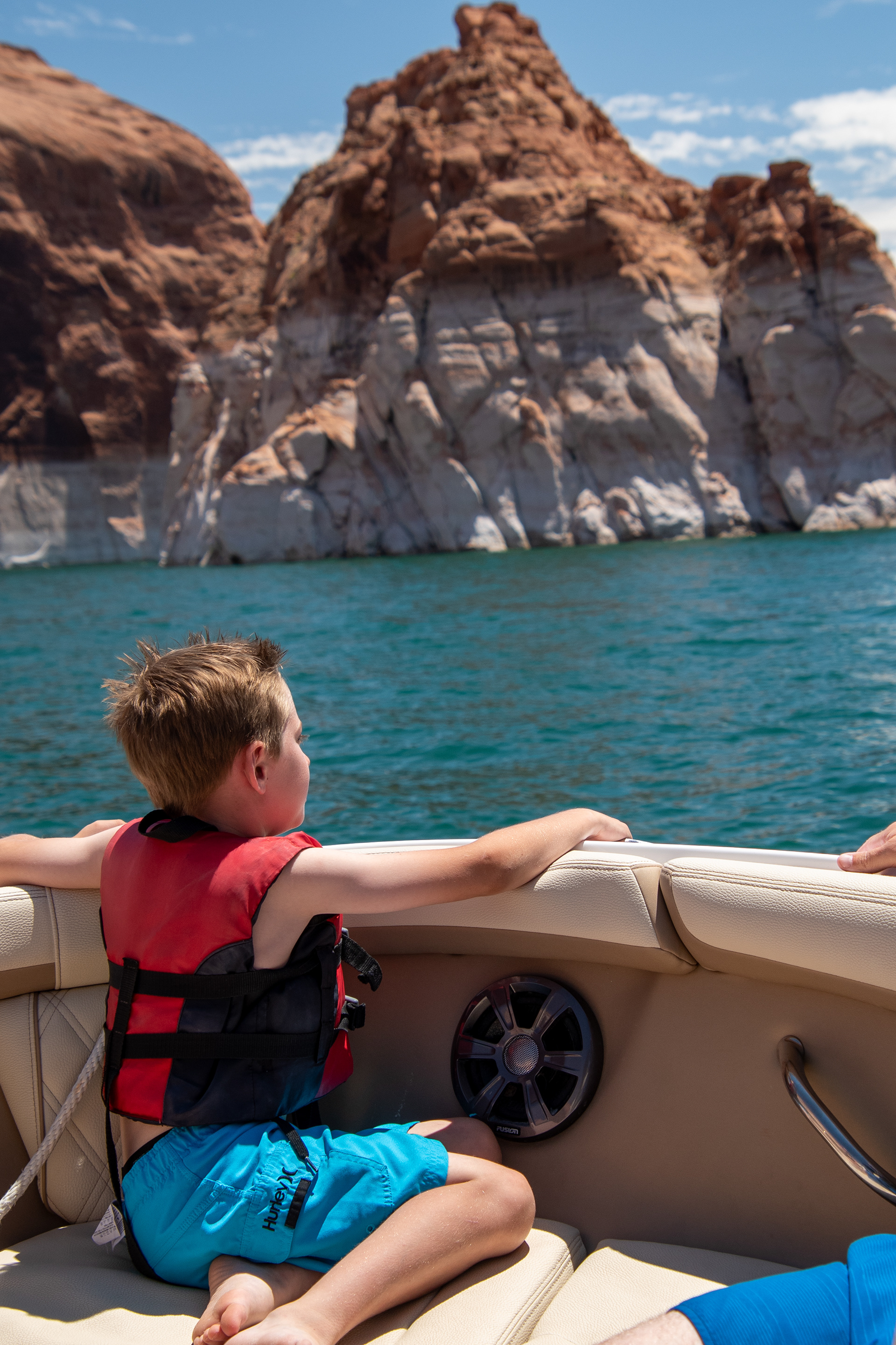 A boy enjoys a boat ride on Lake Powell