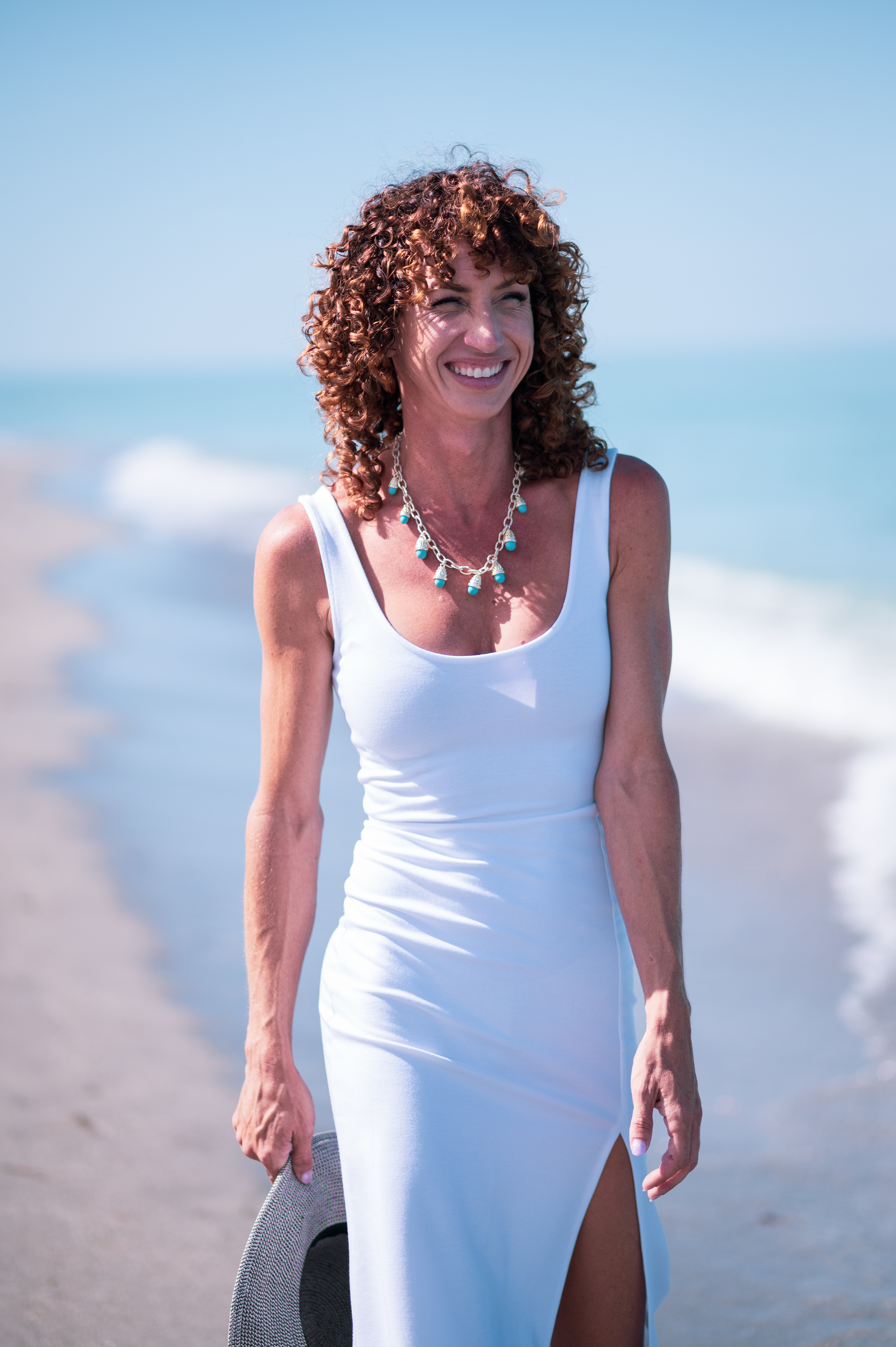 Woman Walking on a Beach