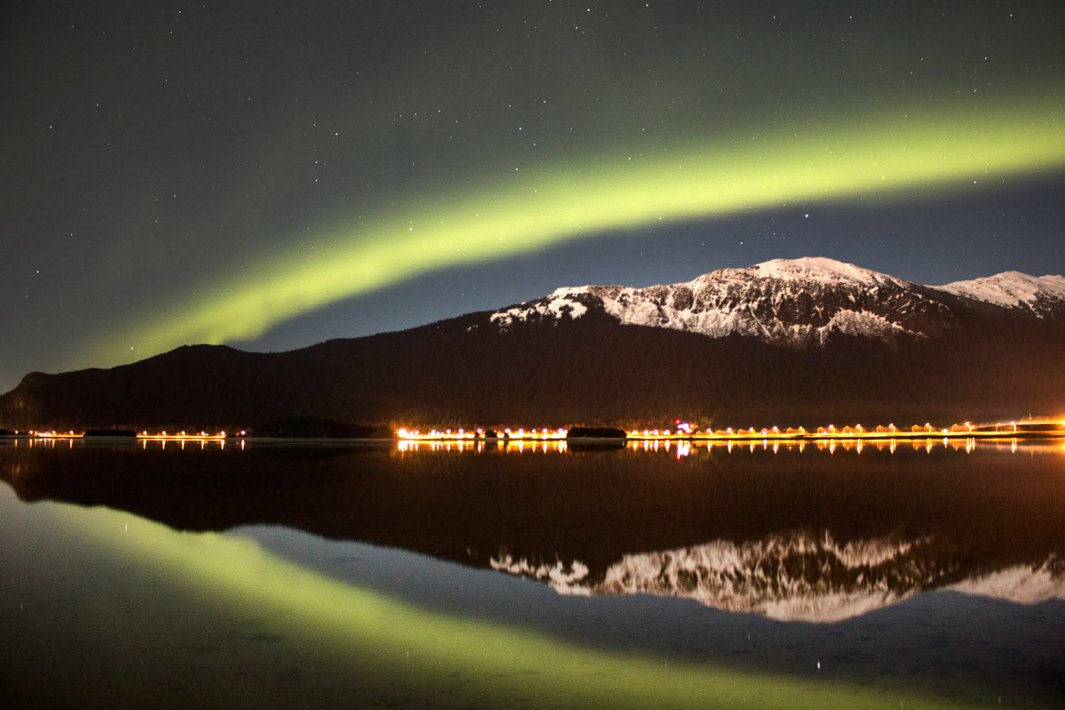 A beautiful streak of green across the sky in Juneau, Alaska. The human eye's night vision prevents us from seeing the full spectrum of the aurora, but the camera sees it just fine.