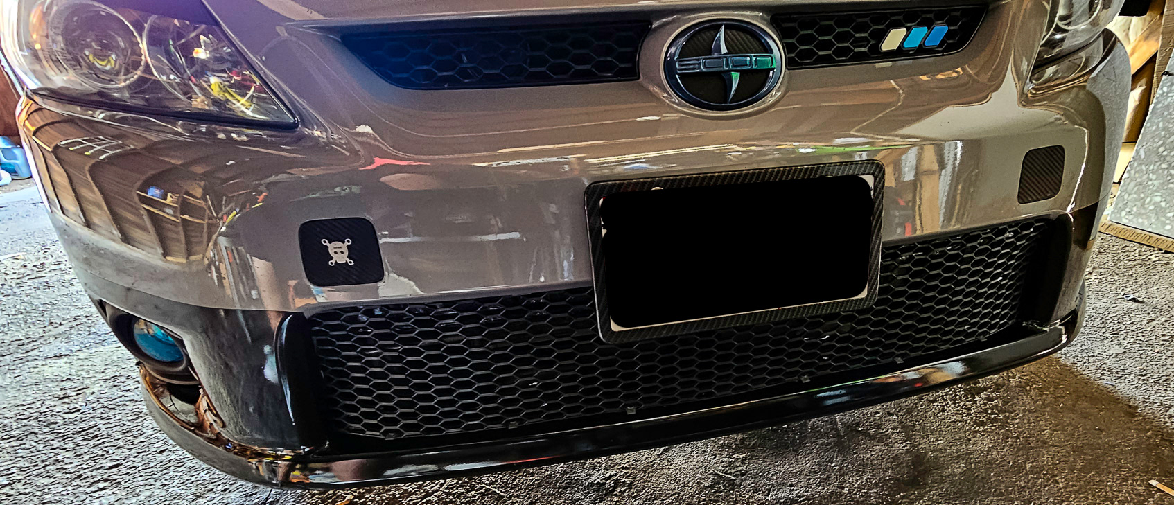 my custom grill that i did myself. obsessed about since i got the car. took a while to figure out what the best material to use and how to apply it.- top and bottom grills