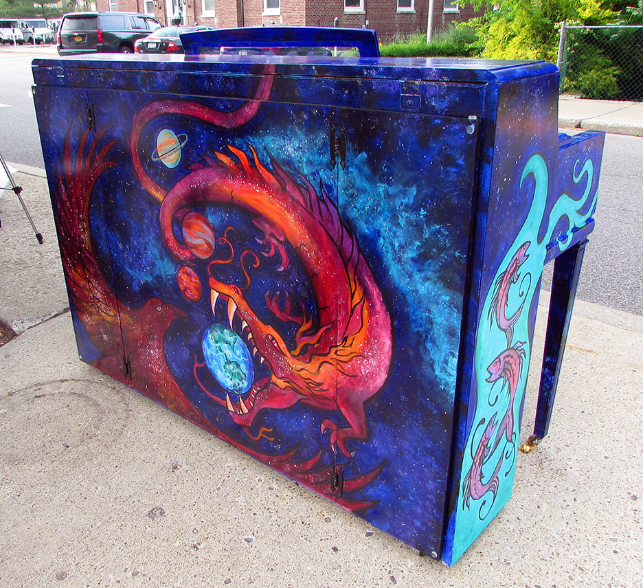 Painted piano back with a cosmic dragon and crow