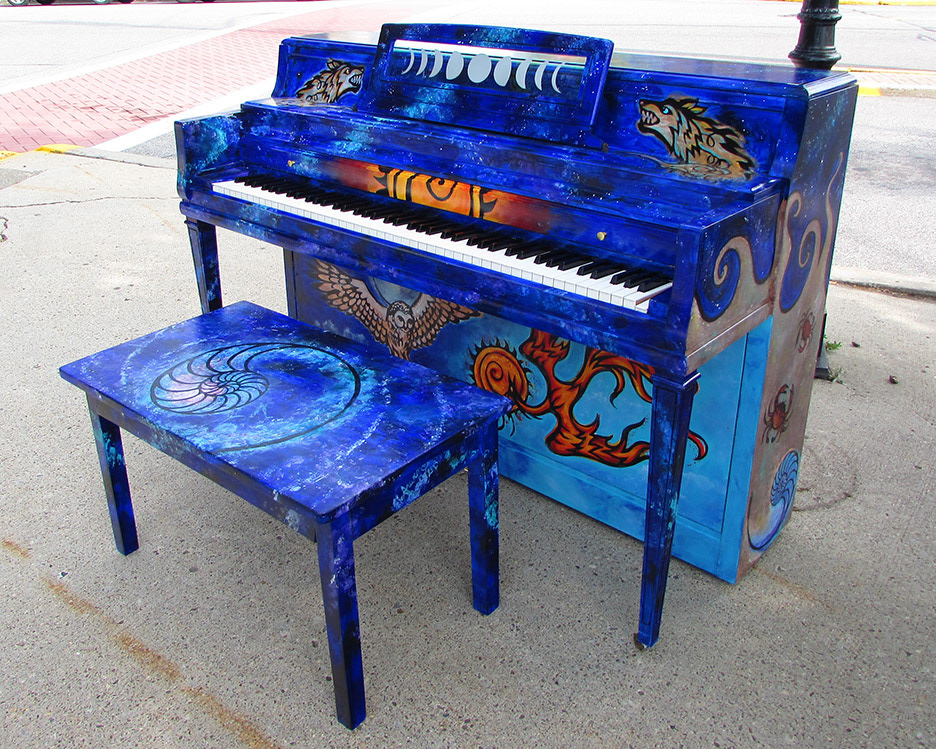 Painted piano front with nautilus shell bench