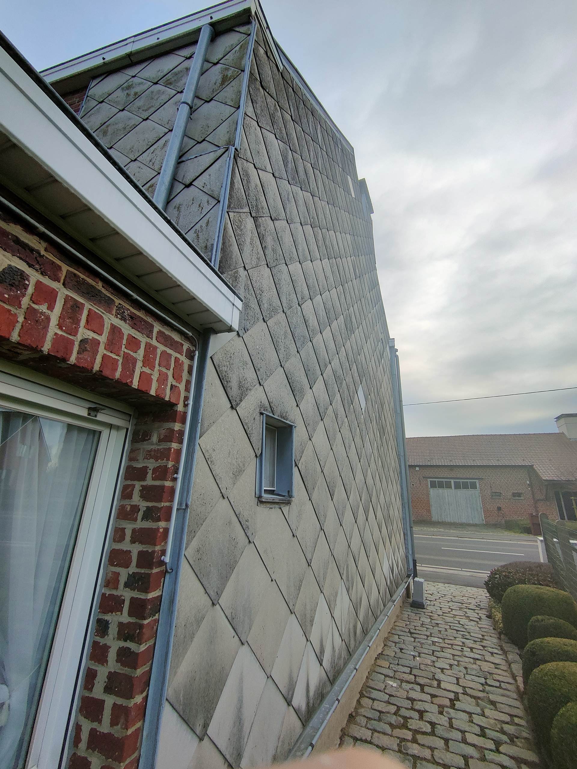 Gevelbekleding in asbestcementleien