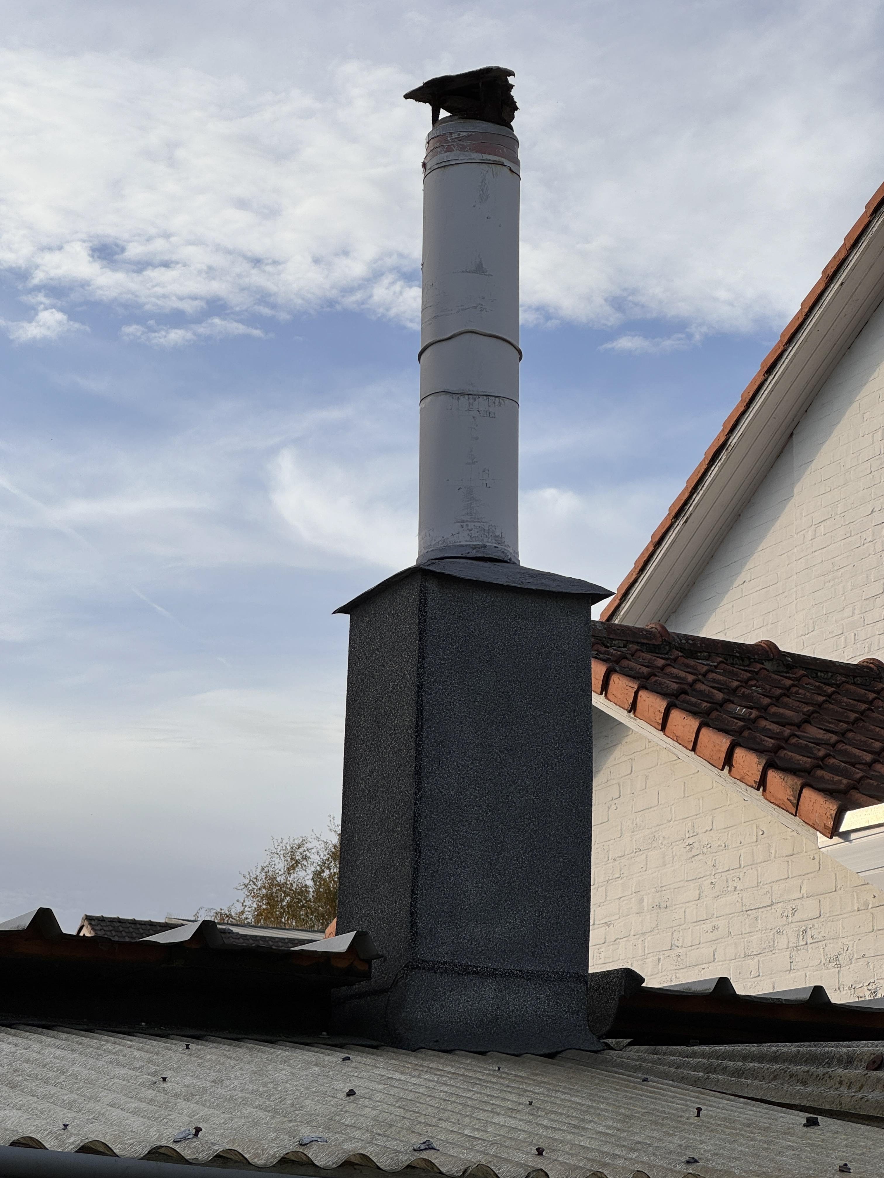 Asbesthoudende schouwhoed