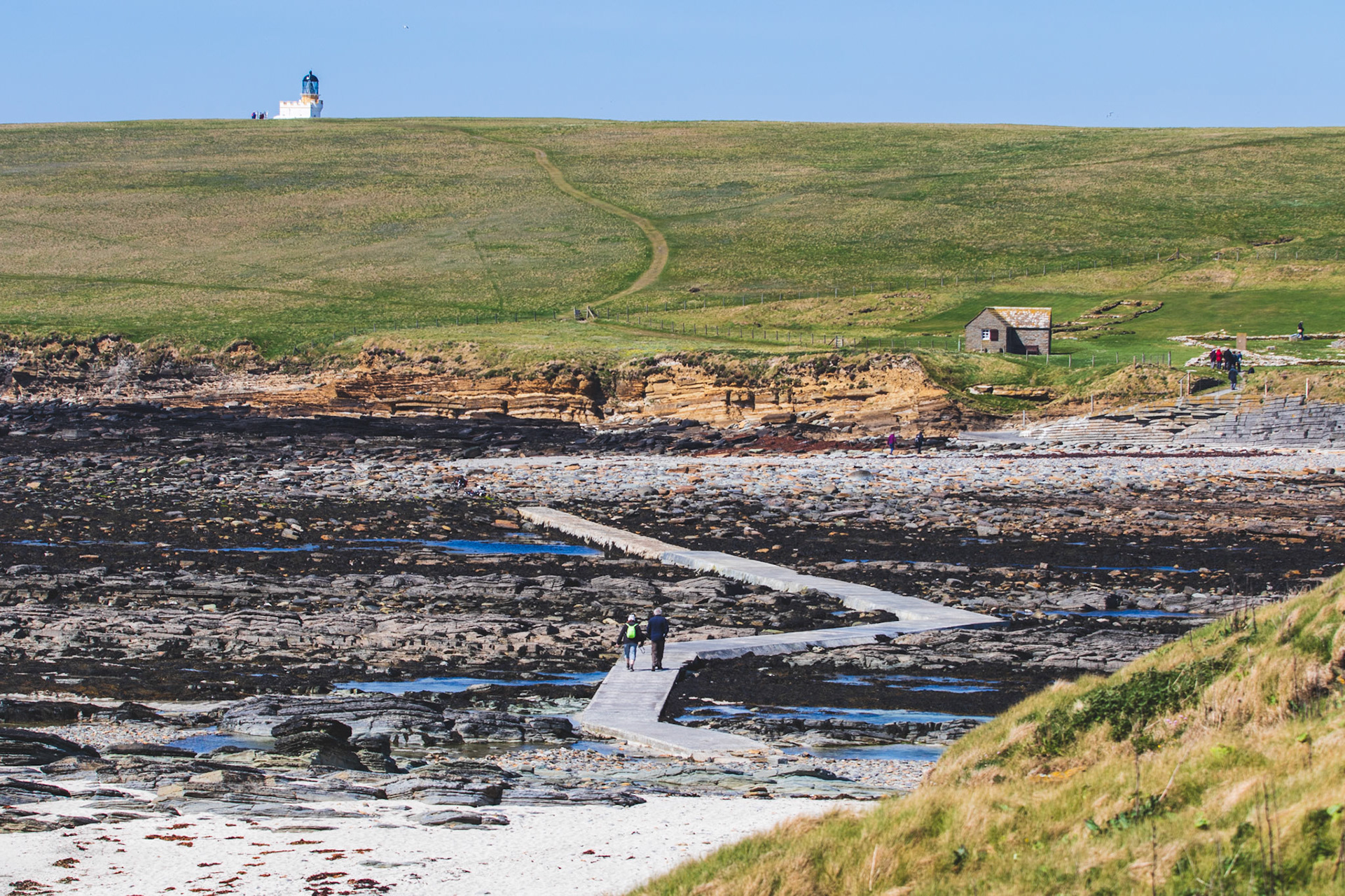Birsay Bay at low tide allows the Bourgh of Birsay and it's lighthouse accessible via a short hike.