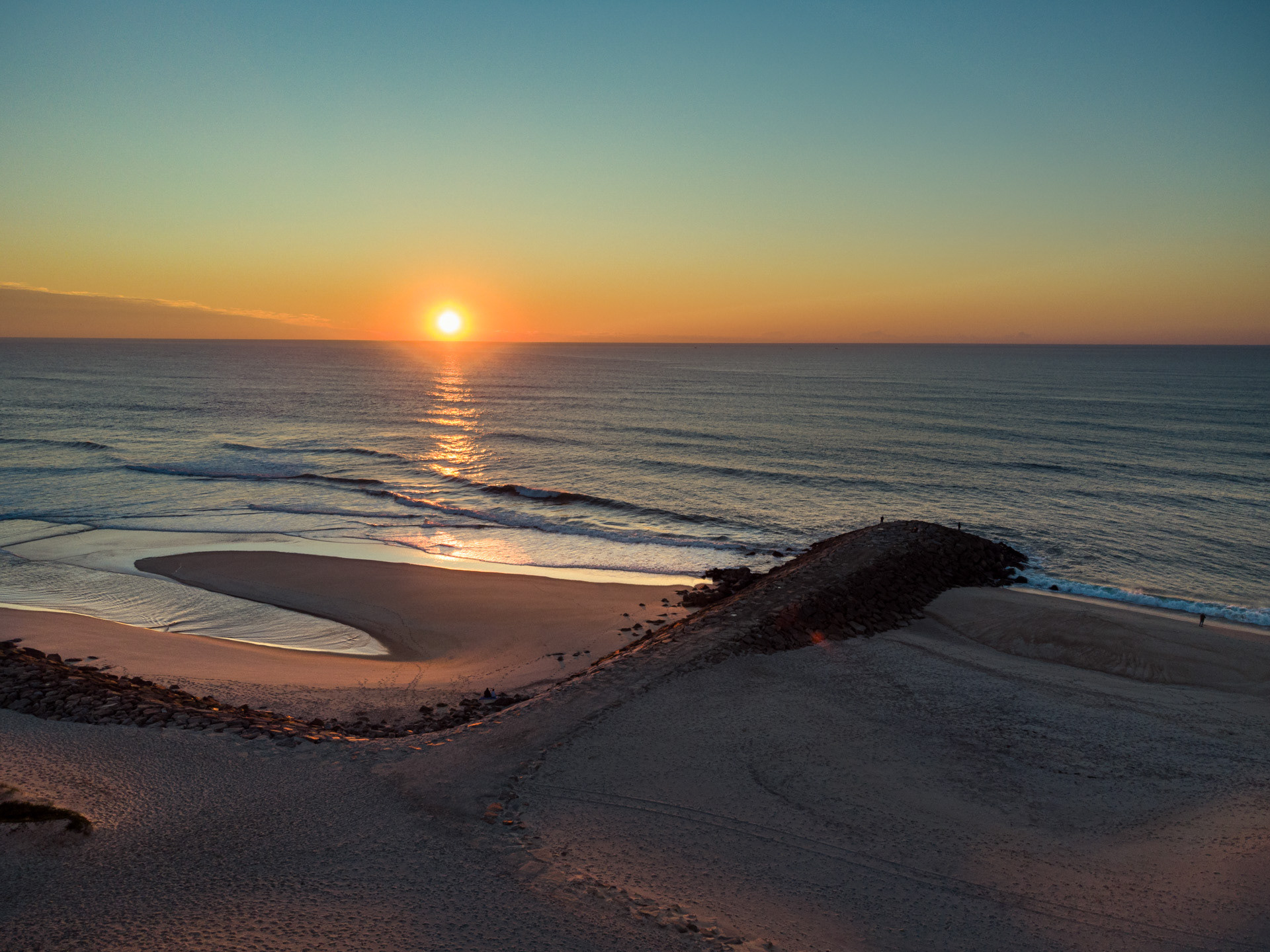 Fotografia aerea por do sol praia da Barra