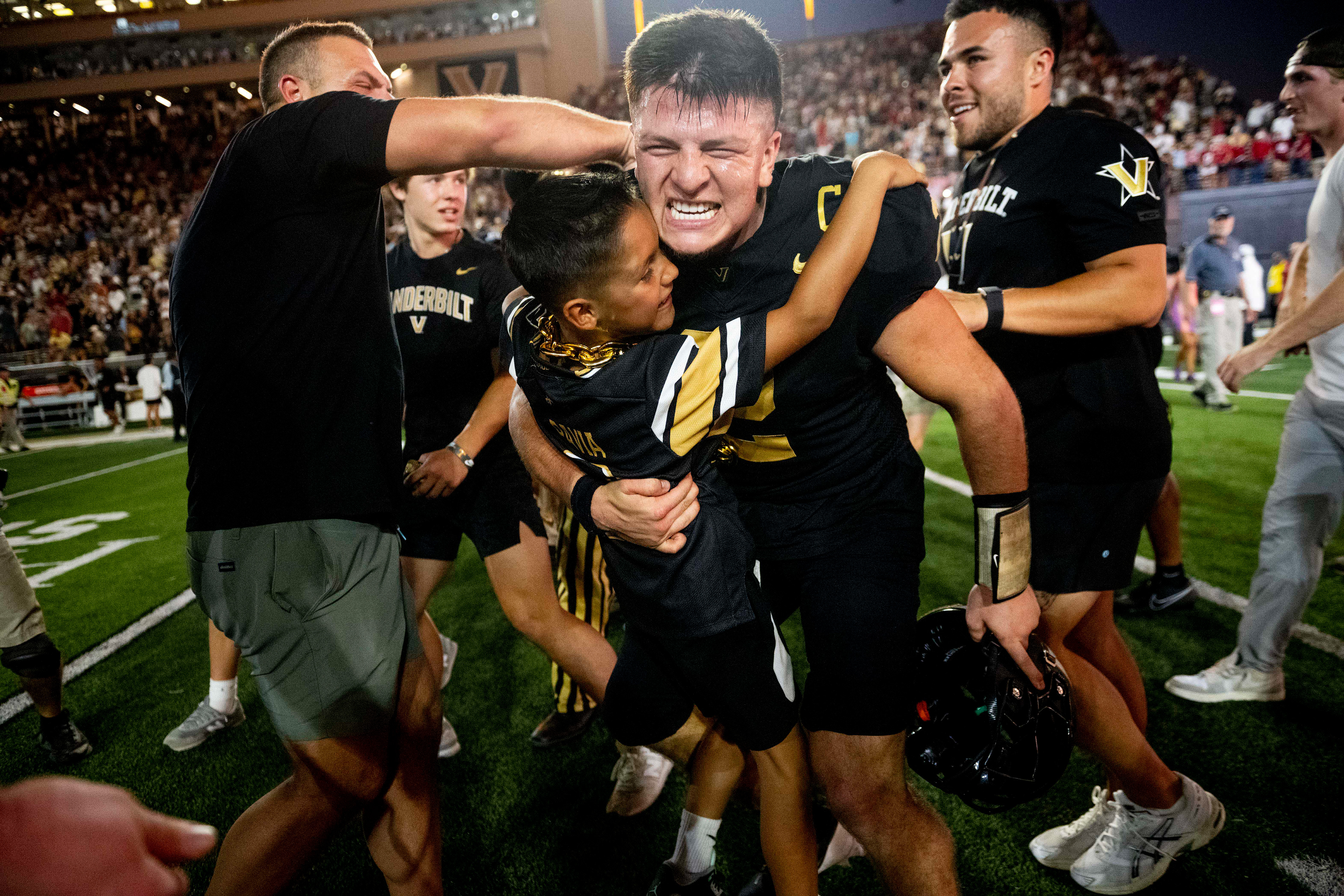 Vanderbilt quarterback Diego Pavia (2) reacts with family after defeating AP No. 1 ranked Alabama 40-35 at FirstBank Stadium in Nashville, Tenn., Saturday, Oct. 5, 2024.