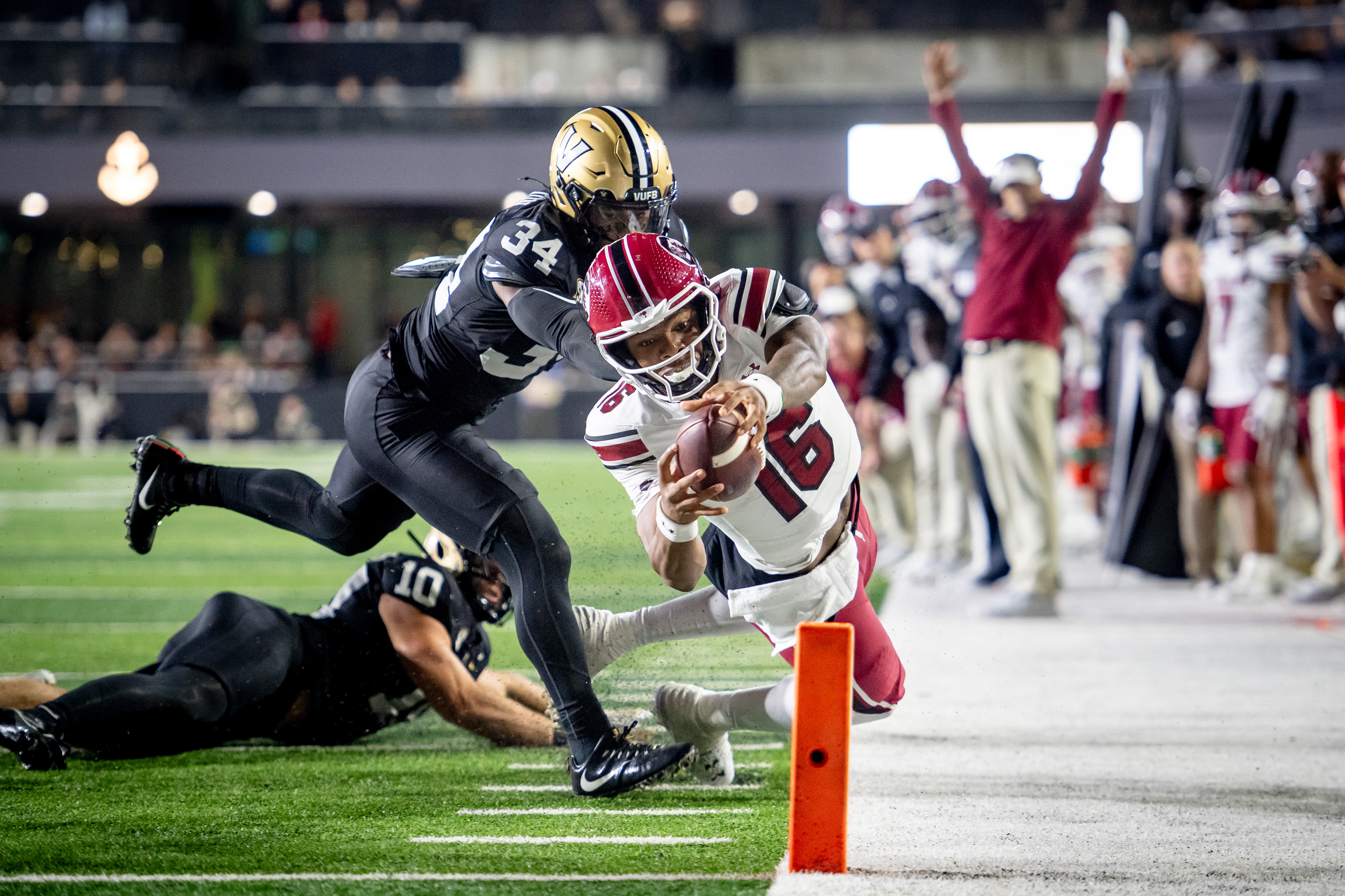 South Carolina quarterback LaNorris Sellers (16) dives into the endzone while evading Vanderbilt linebacker Maurice Hampton Jr. (34) during their football game at FirstBank Stadium in Nashville, Tenn., Saturday, Nov. 9, 2024.