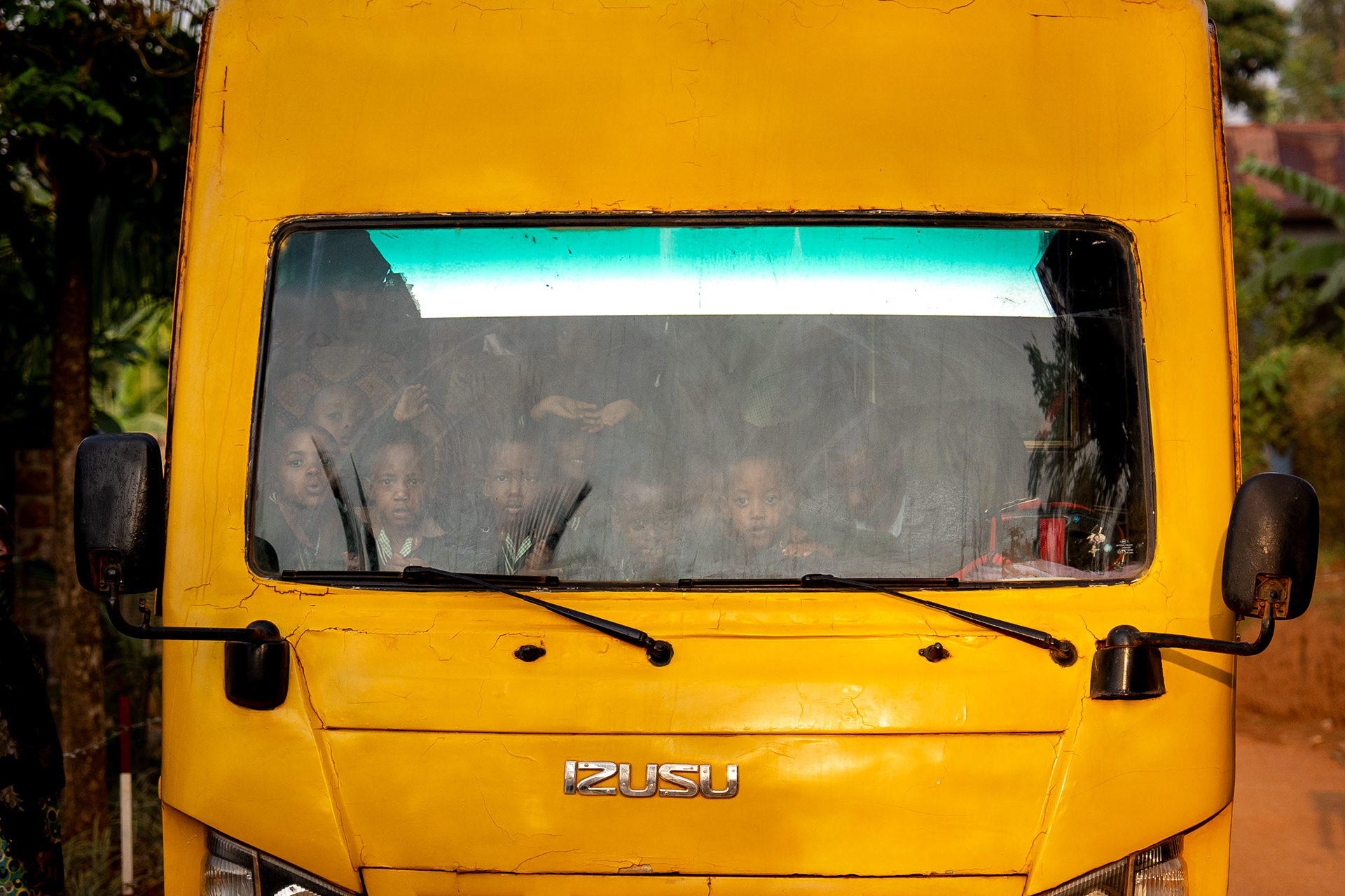 Children arrive for school on the school bus at the Hope Haven School near the Murindi Village in Kigali, Rwanda, Tuesday, March 4, 2025. 