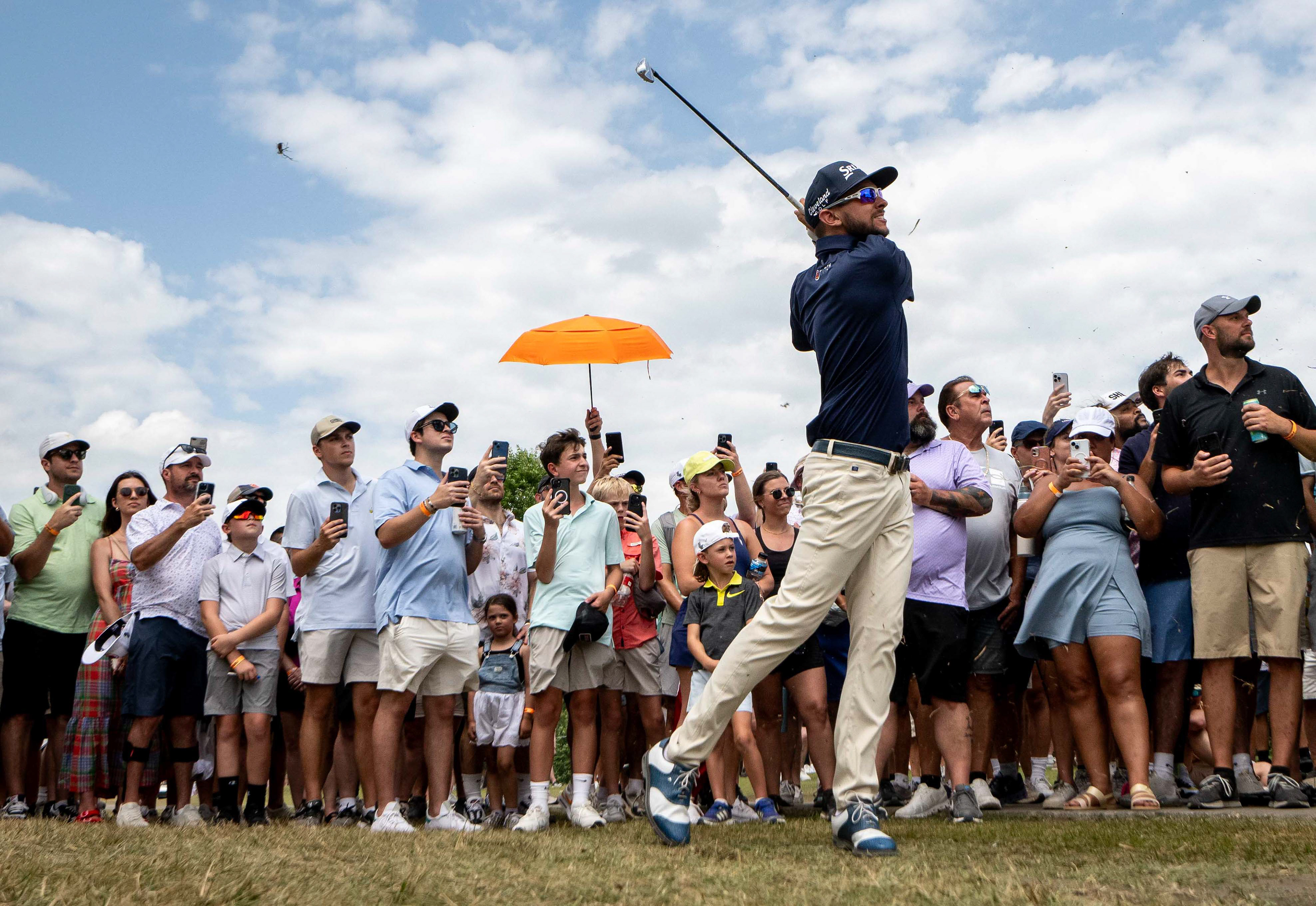John Catlin hits out of the crowd on the final day of the LIV Golf Nashville Tournament at The Grove in College Grove, Tenn., Sunday, June 23, 2024.
