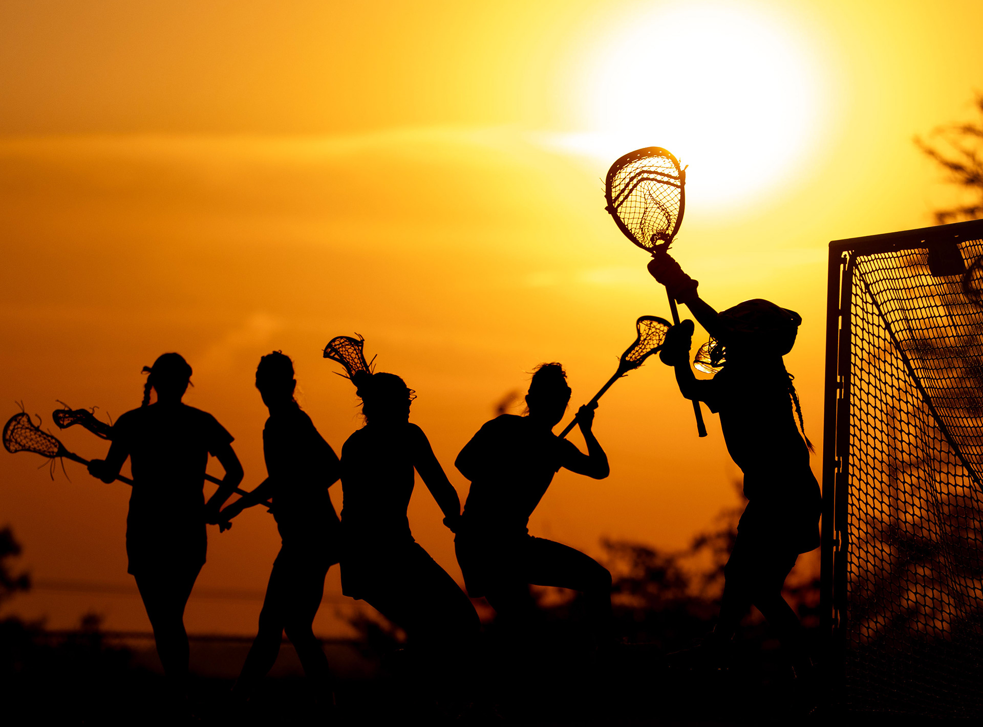 Franklin's Lyla Ebert (23) scores a goal past Ravenwood's Jenna Baumgartel (22) during the third quarter at Ravenwood High School in Brentwood, Tenn., Thursday, April 17, 2025. Ravenwood won 10-9.