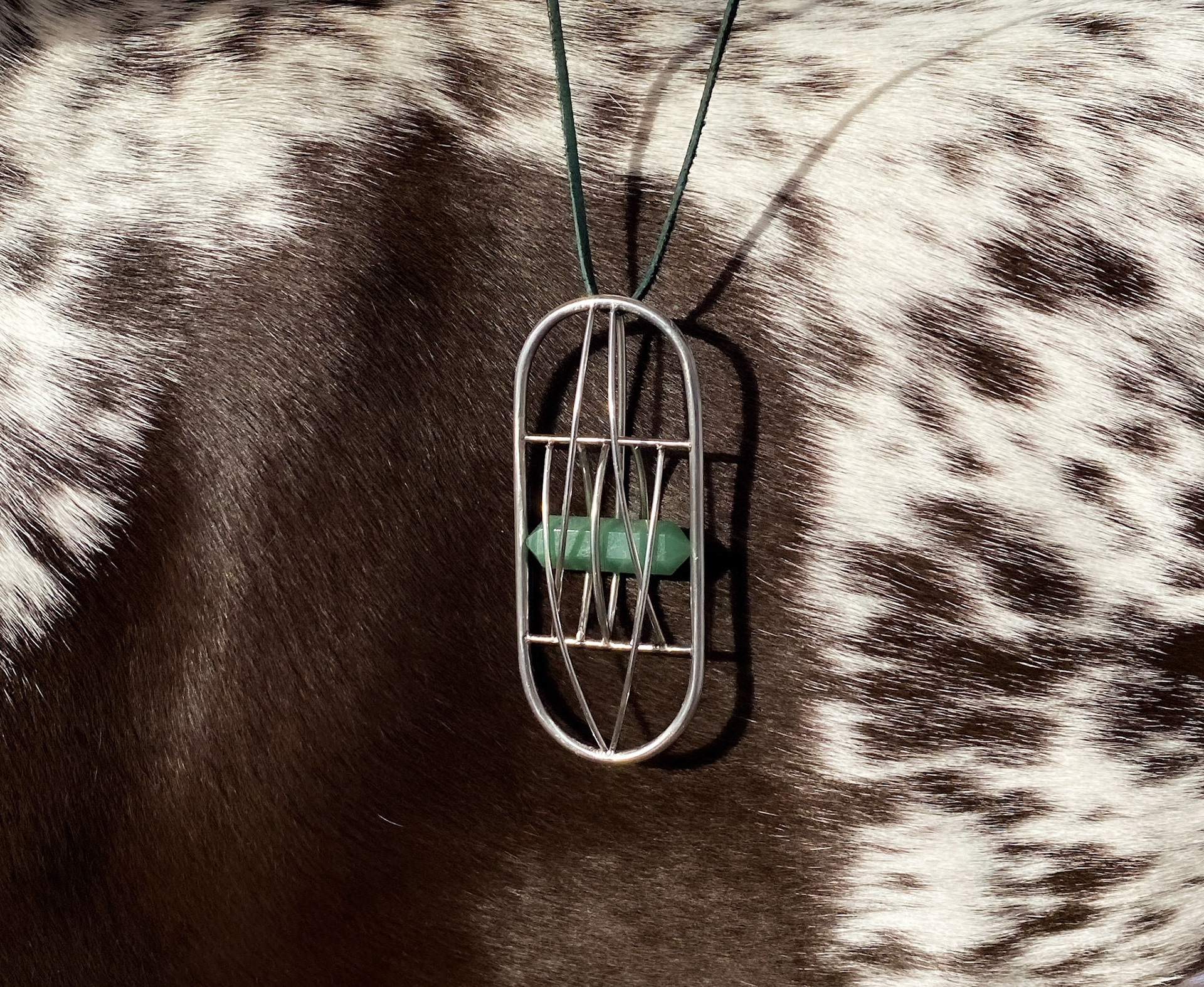 Aviary pendant. Stainless steel, jade.