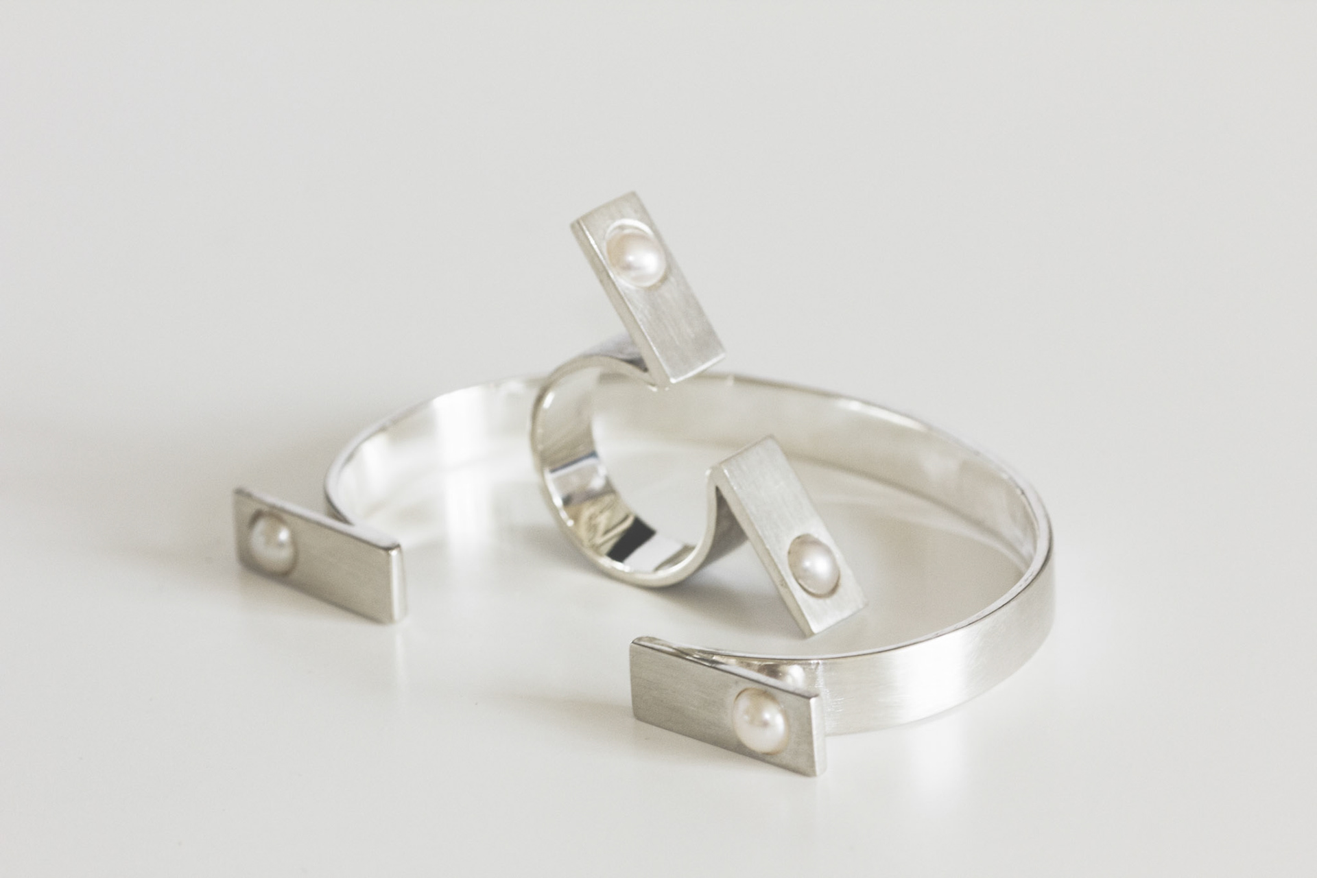 Axis ring and bangle. Silver, saltwater pearls