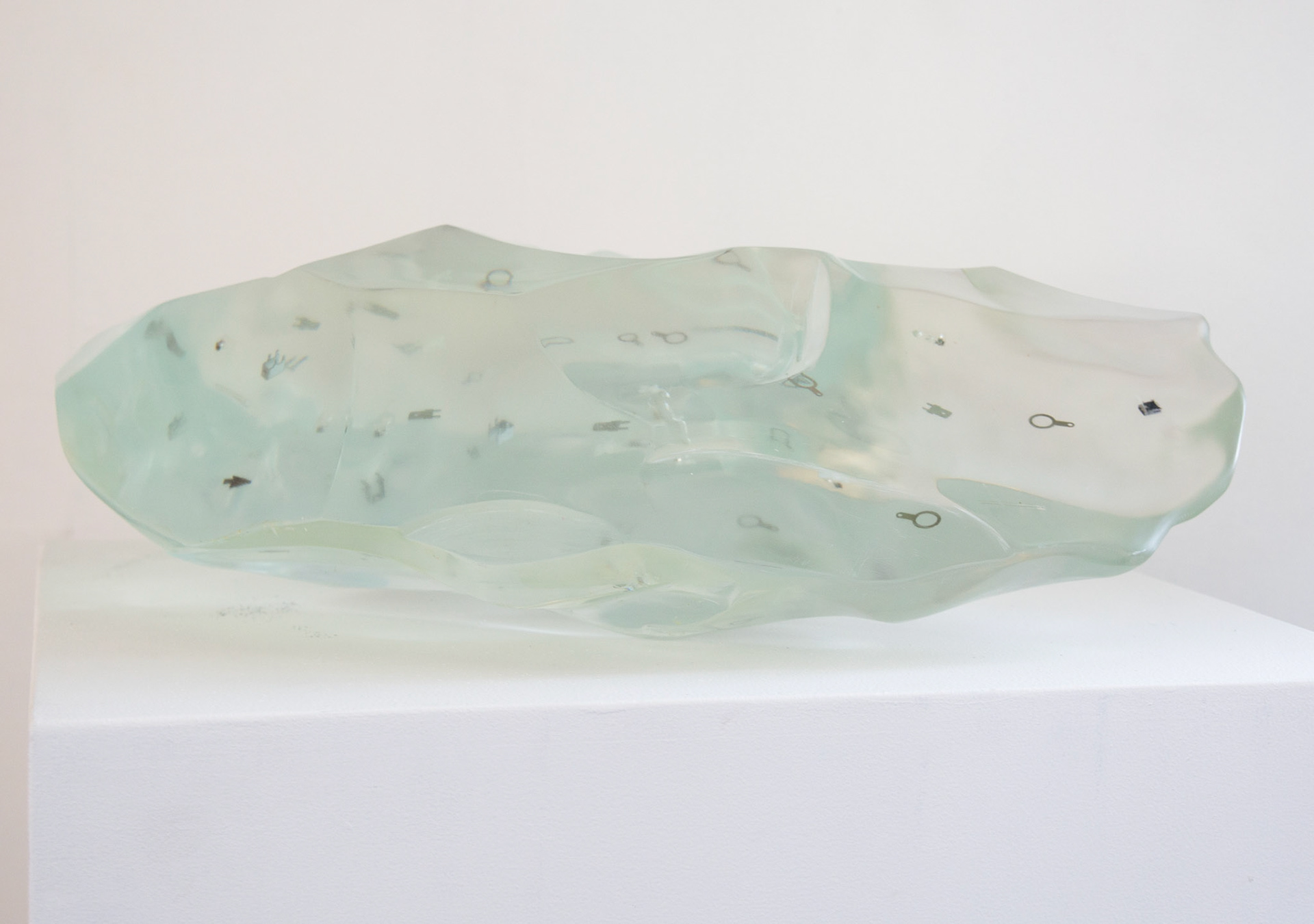STONE TOOL *SOLID AIR*, 2024 /8 +1AP 3D SCANNED ACHEULEAN HANDAXE, SCALED TO 60CM, CAST IN CLEAR RESIN WITH MISCELLANEOUS ELECTRONIC COMPONENTS SUSPENDED WITHIN 17 x 60 x 34 cm