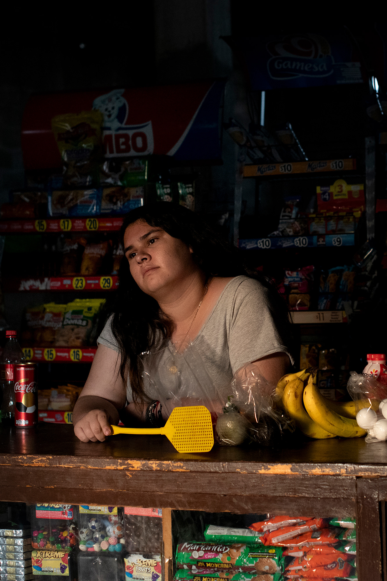 Lourdes "Lulys" stares off into the distance, 2018
