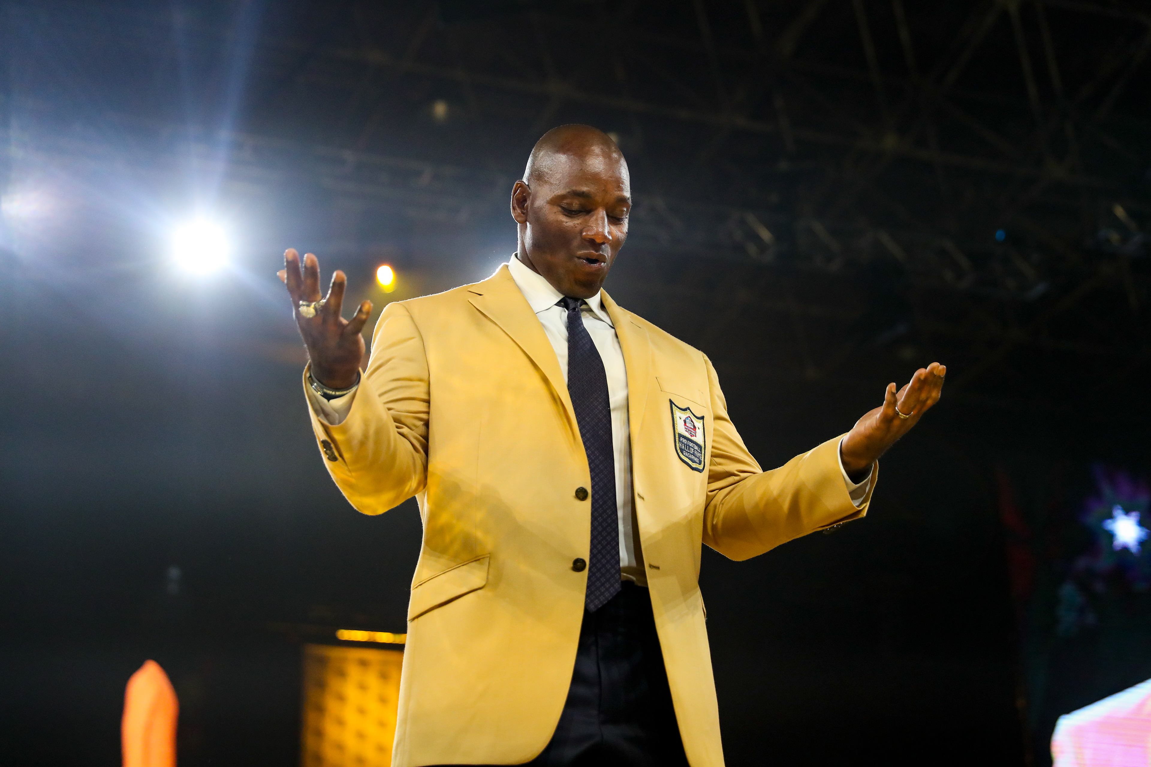 2022 Pro Football Hall of Fame Enshrinee Bryant Young takes a moment after putting on his Gold Jacket for the first time.