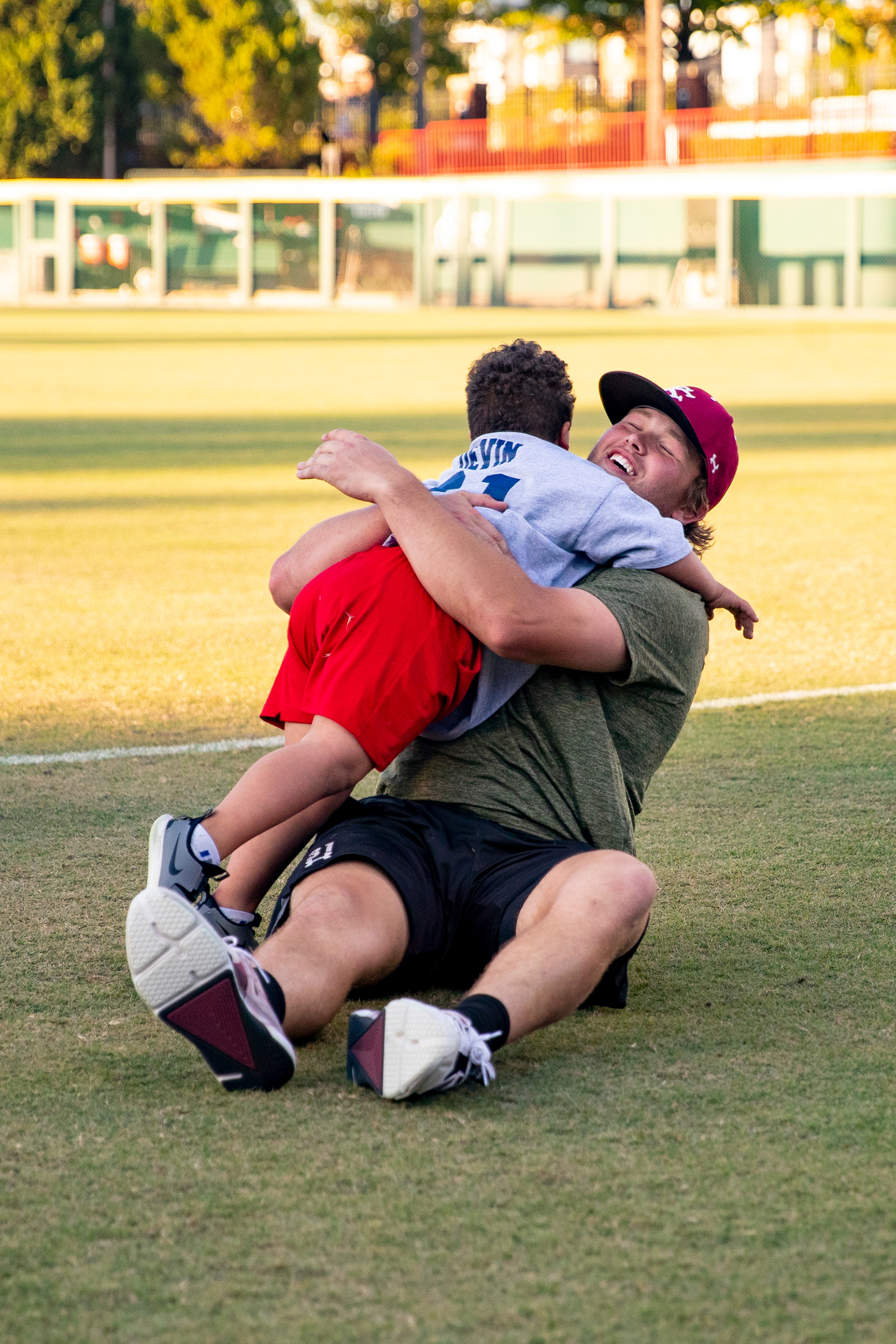 Senior David Cromer hugs an athlete of the Screaming Eagles.