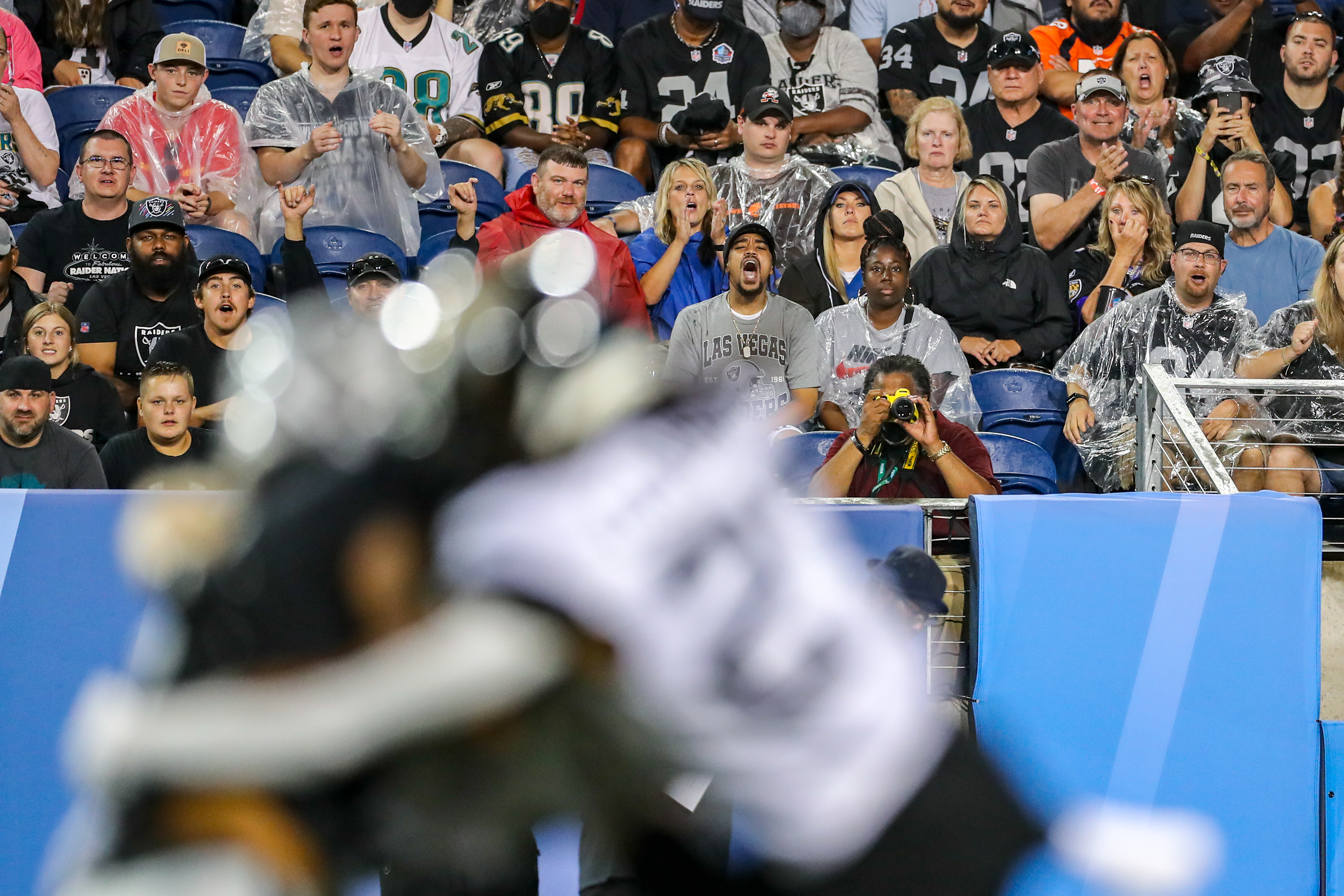 The crowd at the 2022 Hall of Fame Game reacts to a play on the field.