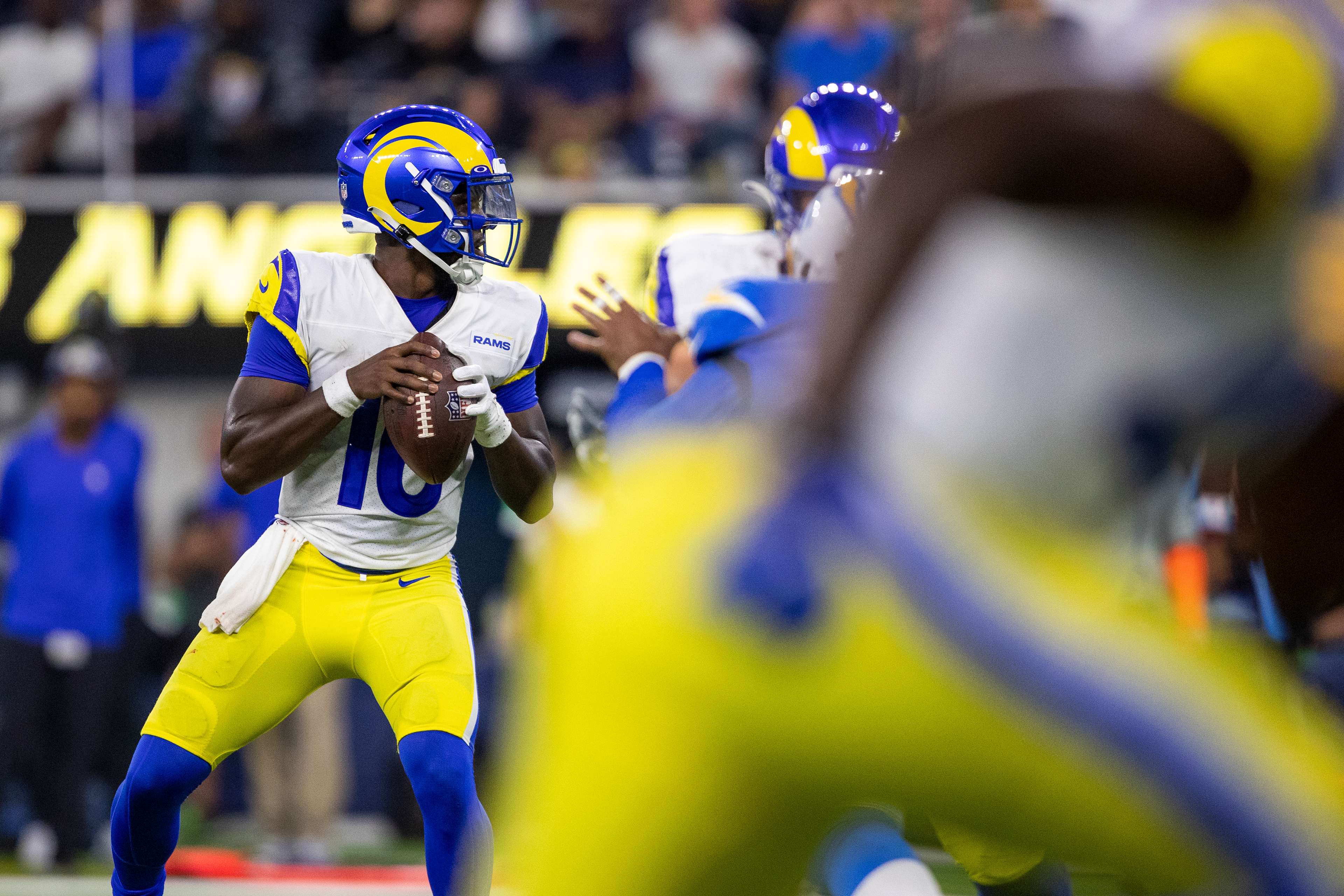Los Angeles Rams quarterback Bryce Perkins looks down-field during a play.