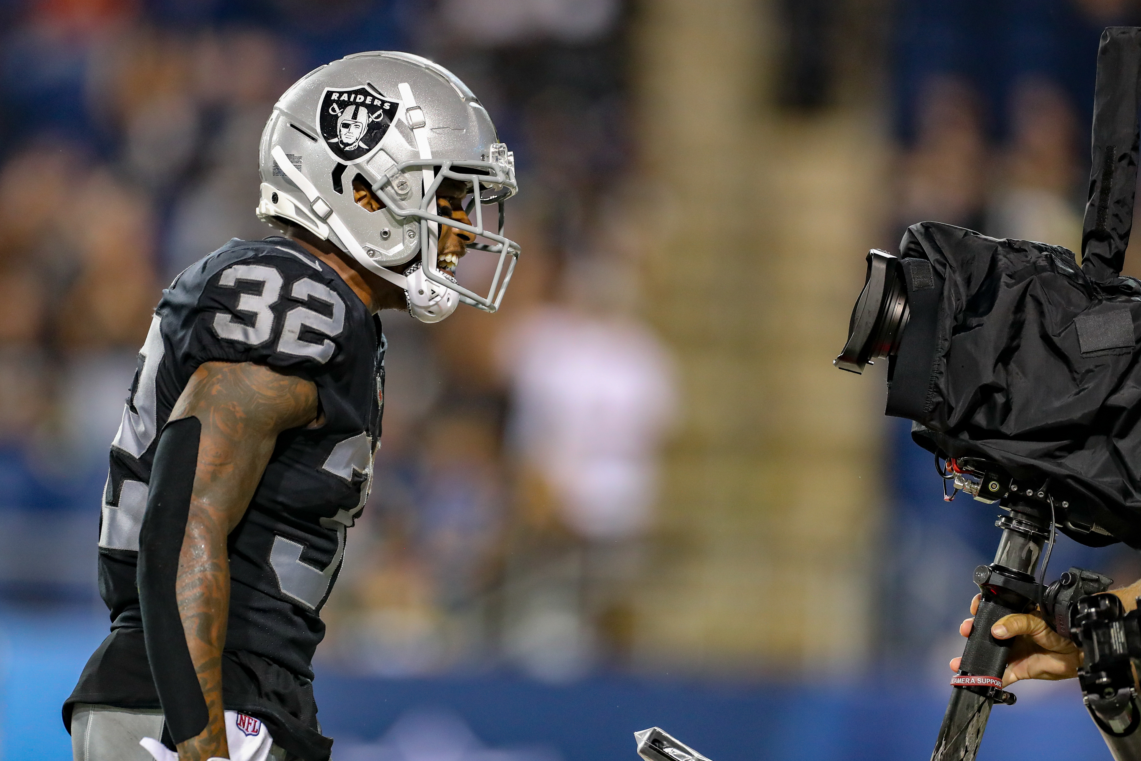Las Vegas Raiders Austin Walter yells into the broadcast camera. 