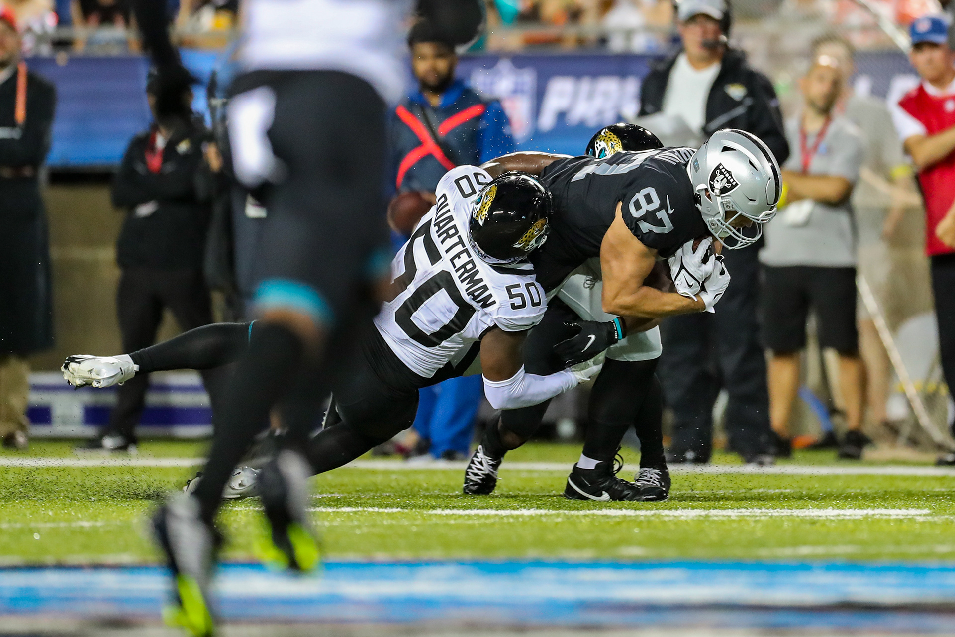 Las Vegas Raiders tight end Foster Moreau fights to cross the goal line during a tackle. 