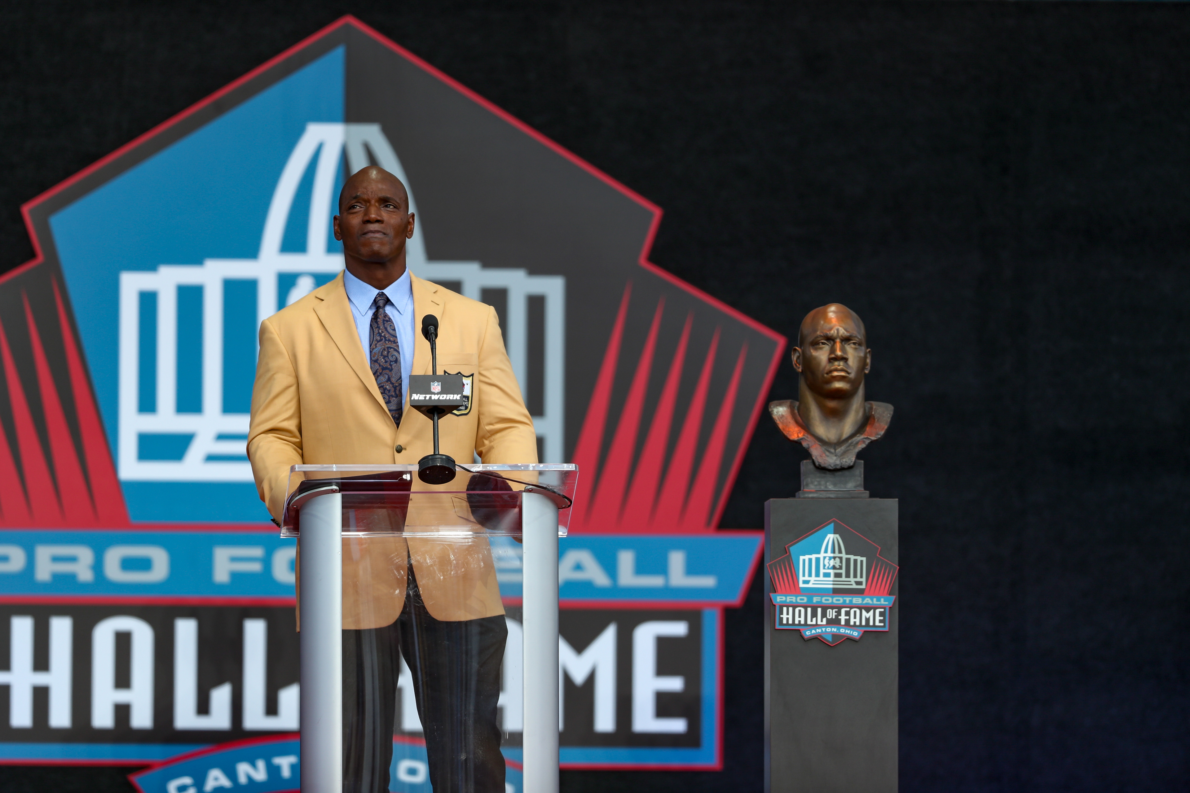 2022 Pro Football Hall of Fame Enshrinee Bryant Young takes a moment after his enshrinement speech.