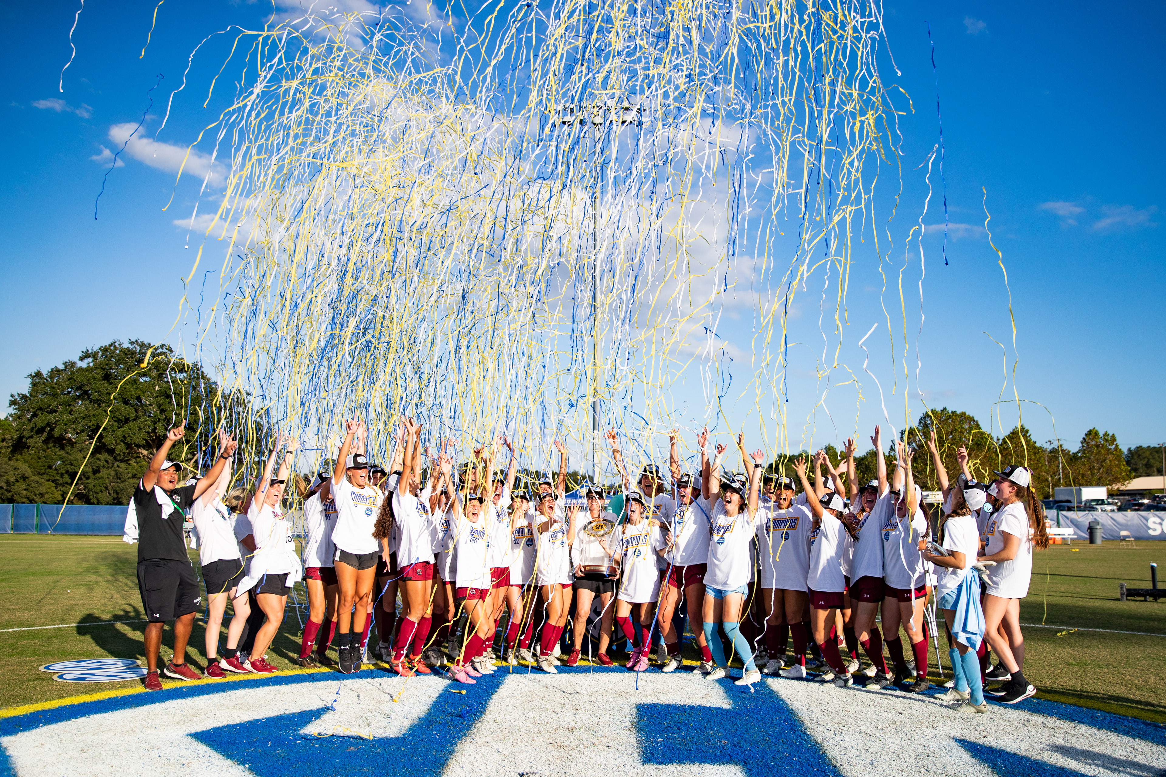 The Gamecock Women's Soccer team celebrates after winning the 2022 SEC Championship.