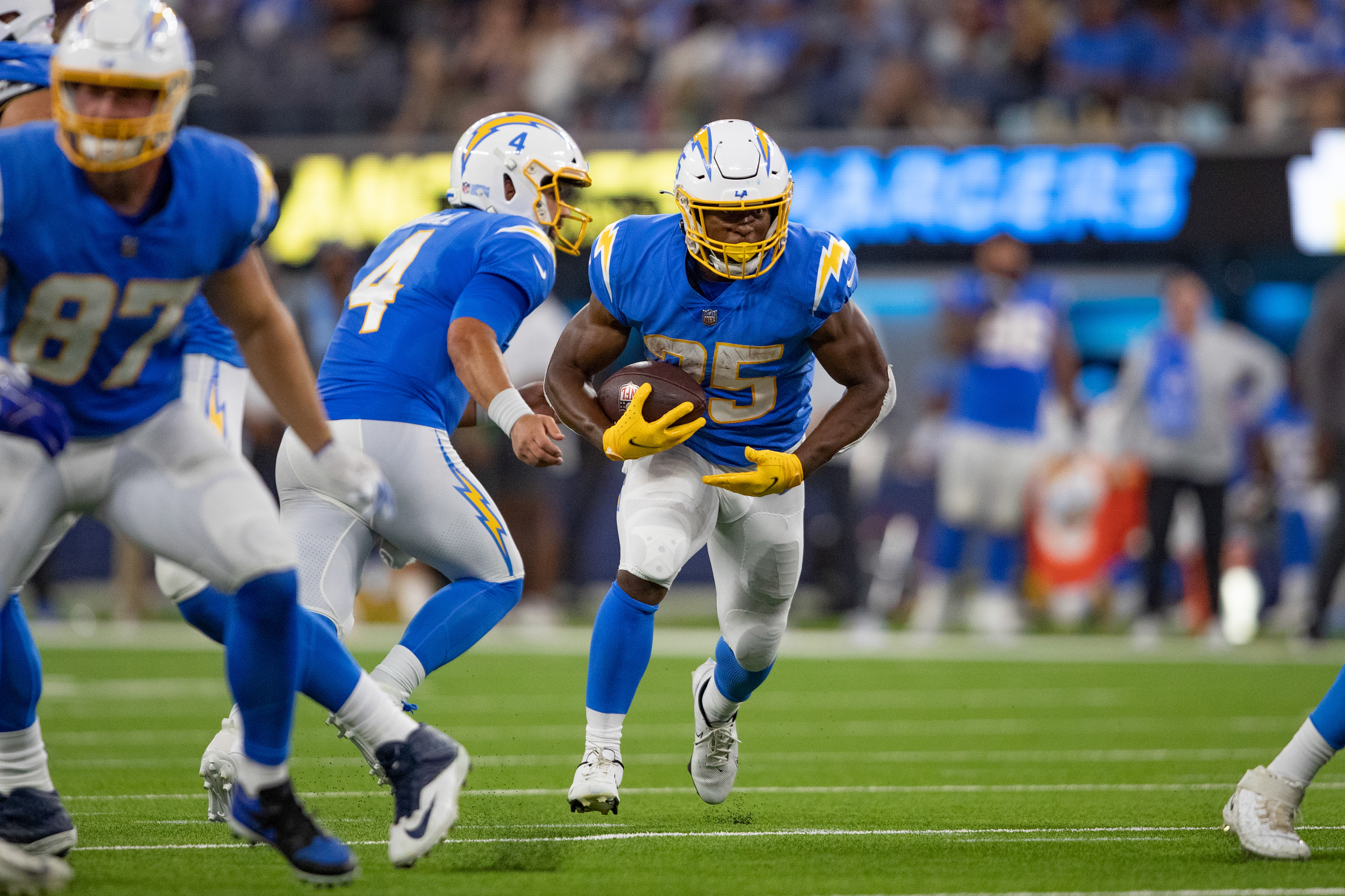 Los Angeles Chargers running back Joshua Kelley runs down the field. 