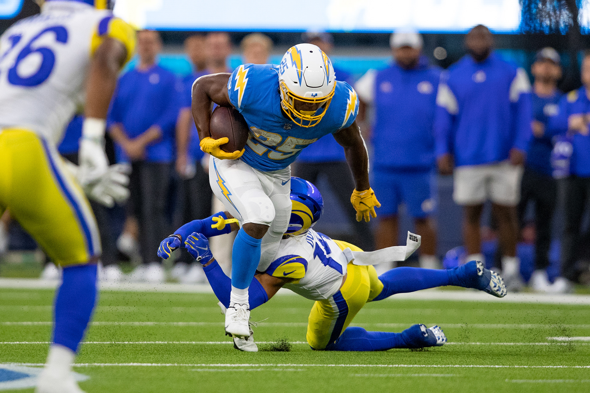 Los Angeles Chargers running back Joshua Kelley avoids a tackle during the game. 