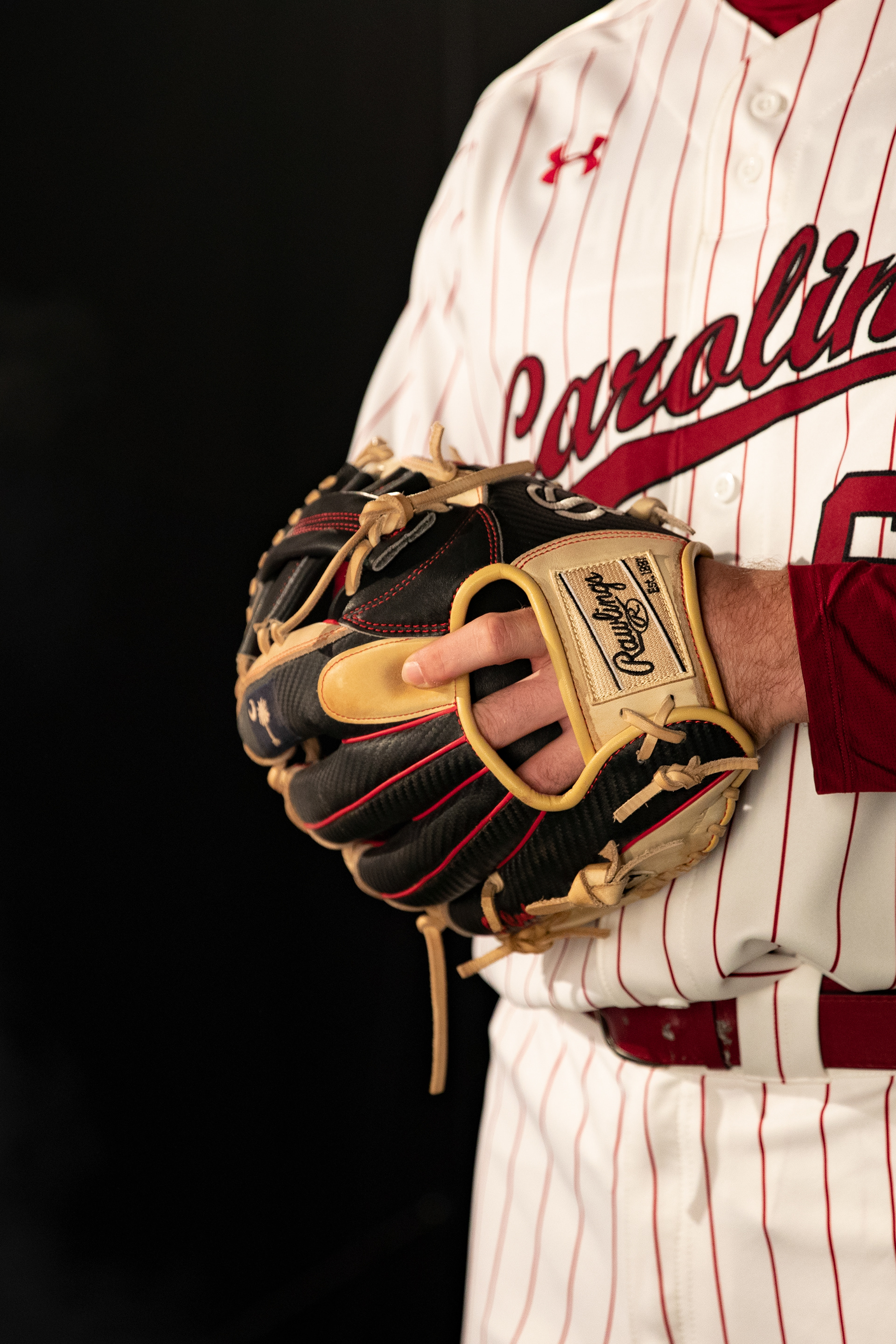 Gamecock Baseball Will McGillis holds his glove during Media Day.
