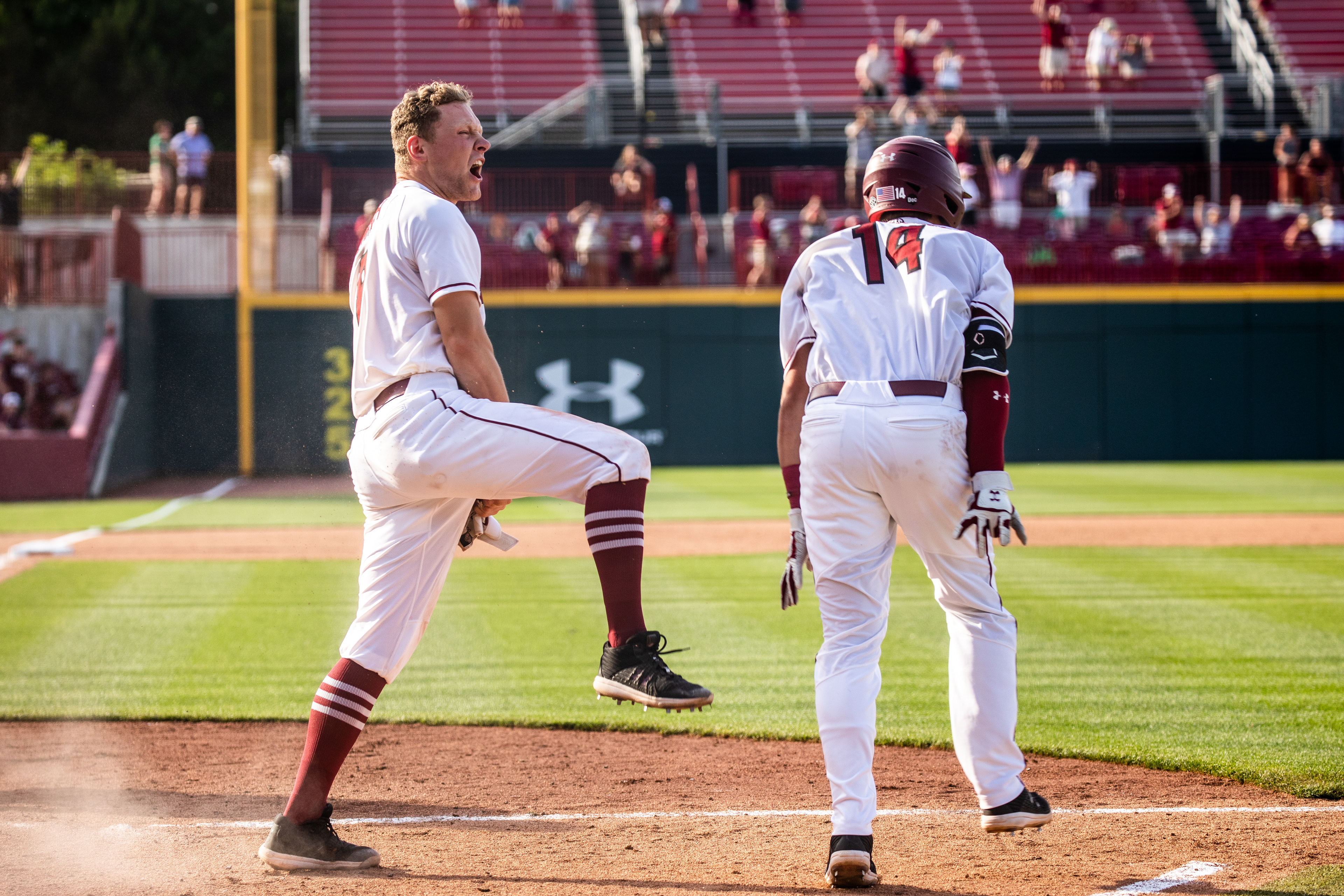 Gamecock Baseball infielder Jeff Heinrich runs to home base and celebrates during the Gamecocks’ 11-inning walk-off win against Mississippi State on May 9, 2021.