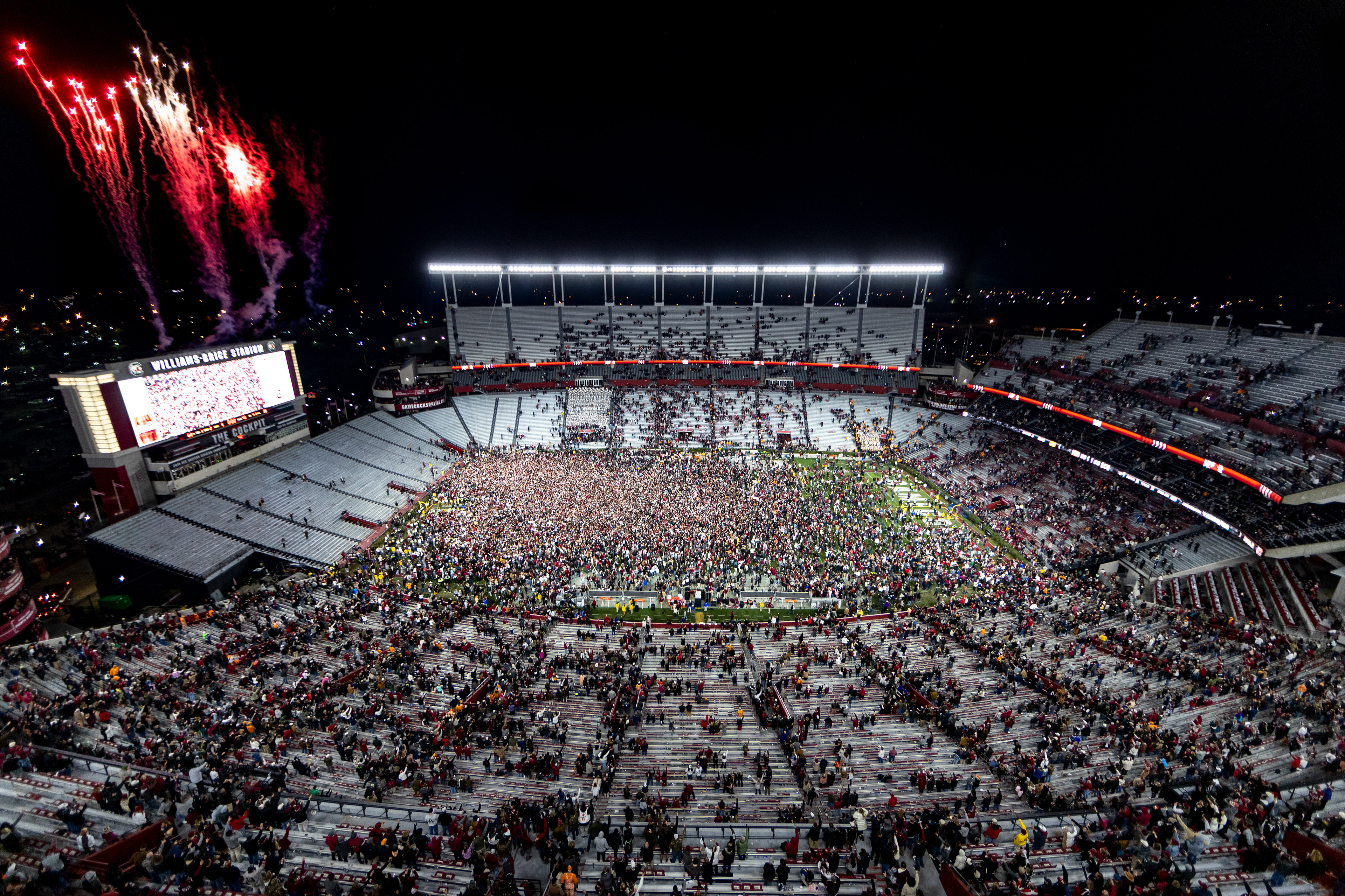 Gamecock Football fans storm the field after Carolina beats #5 Tennessee 63-38 on November 19, 2022 at Williams-Brice Stadium in Columbia, South Carolina. Gamecock Football fans storm the field after Carolina beats #5 Tennessee 63-38 on November 19, 2022 at Williams-Brice Stadium in Columbia, South Carolina.