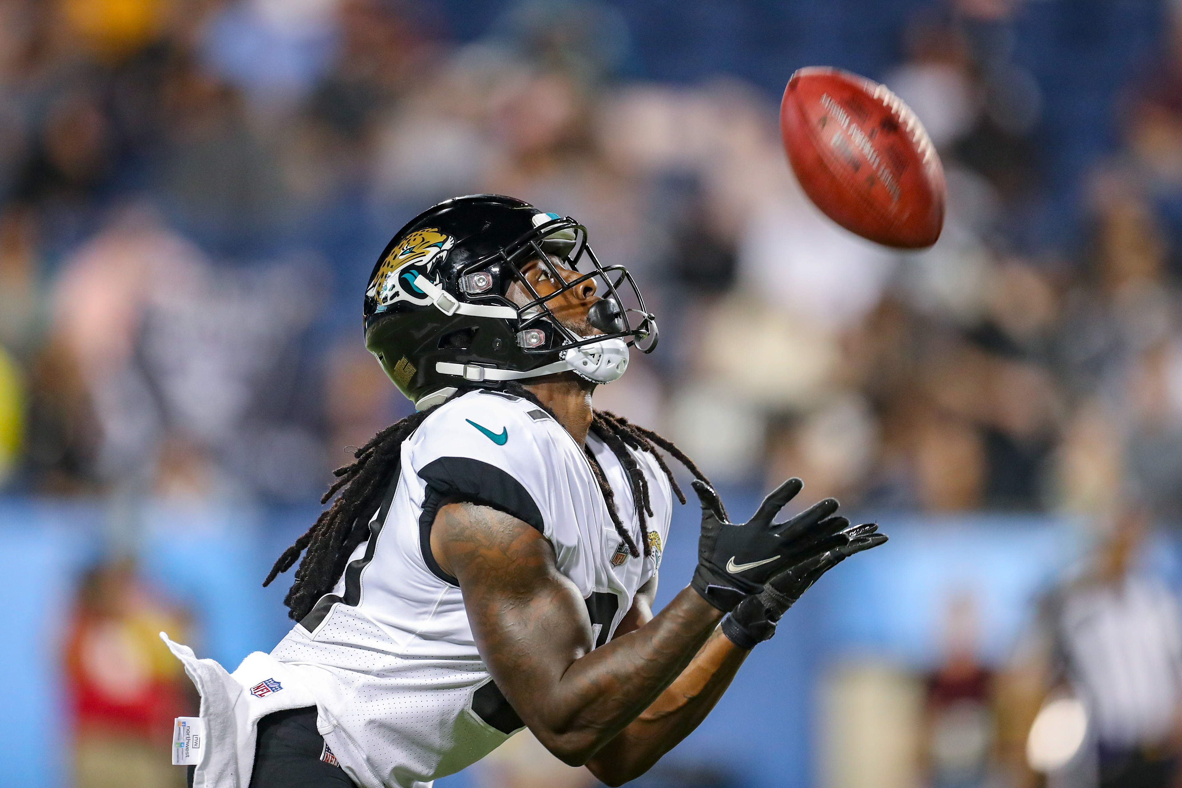 Jacksonville Jaguars kick returner Willie Johnson catches the ball.