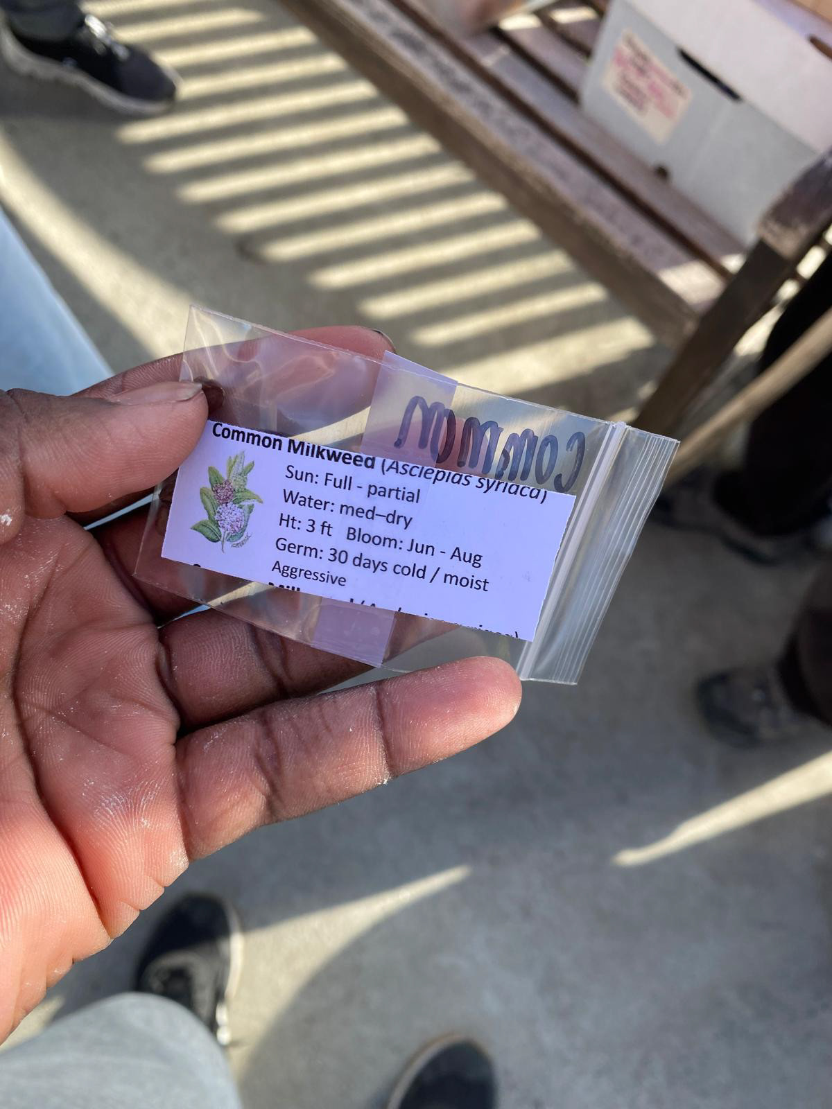 Example seed packet users would hand out at community events.