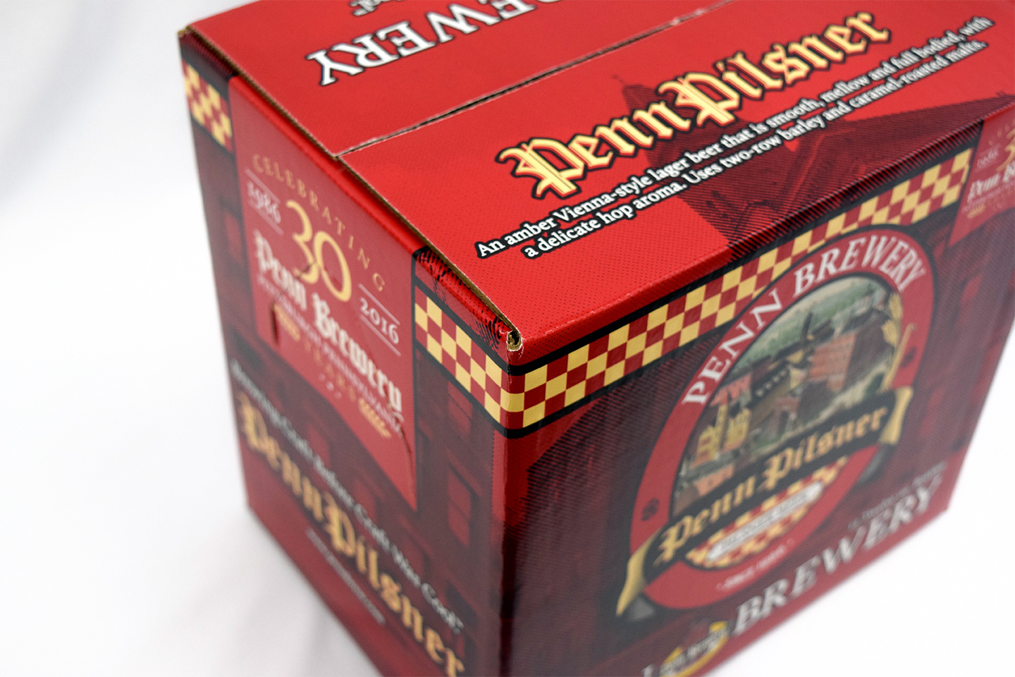 Photograph of Penn Brewery's 30th Anniversary box for Penn Pilsner designed by Andrew Thompson