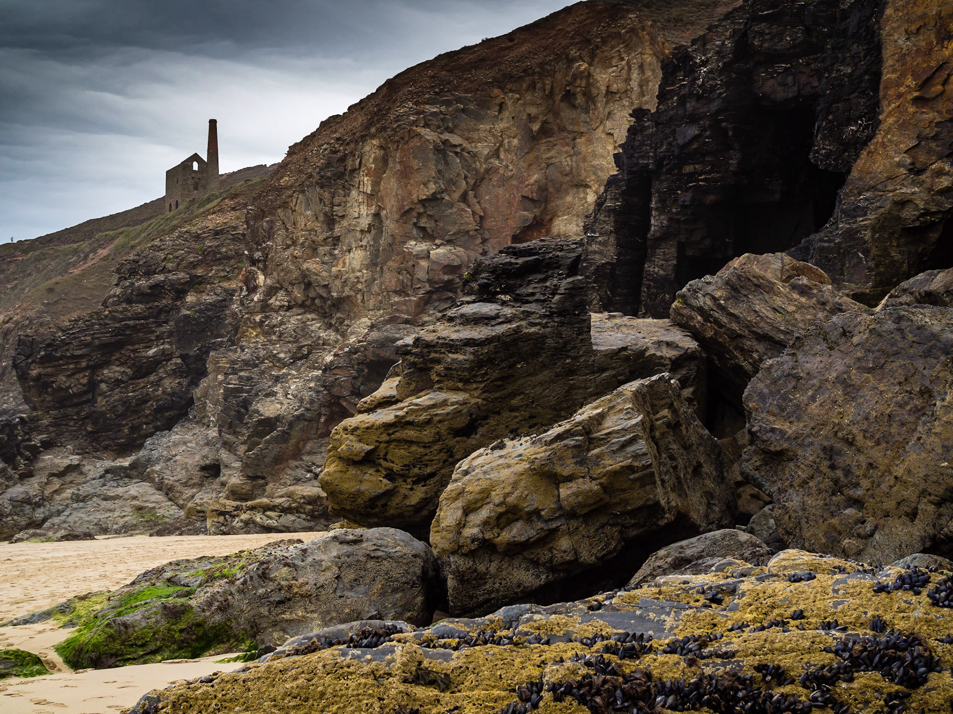 Porthtowan beach view of Towanroath pumping engine house Chapel Porth Cornwall