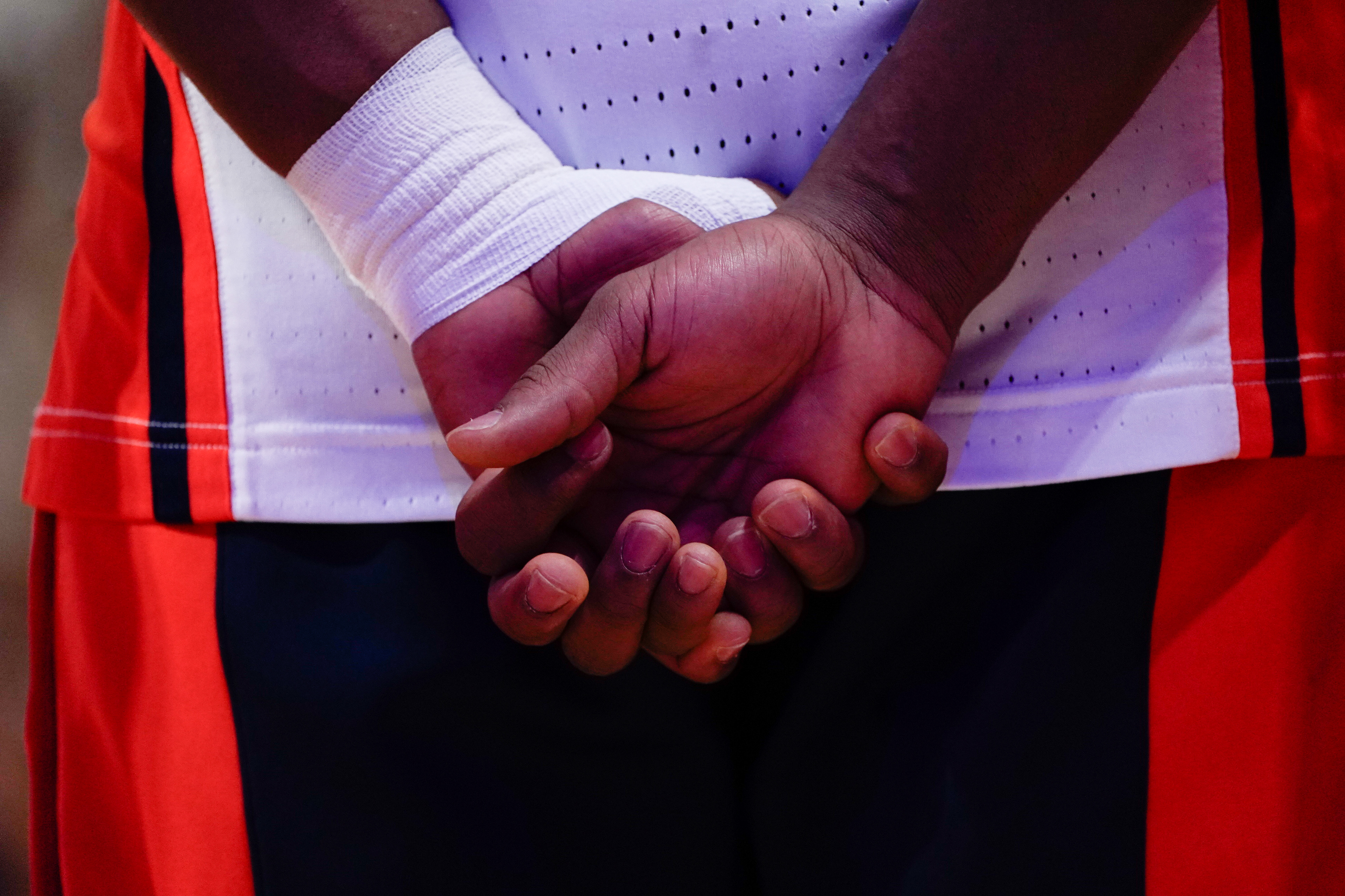 Syracuse guard J.J. Starling’s (2) taped hands are seen during the national anthem before a college basketball game between the Syracuse Orange and the California Golden Bears on February 11, 2026, at the JMA Wireless Dome in Syracuse, NY (Photo by Brody Shuffler/Syracuse Athletics).