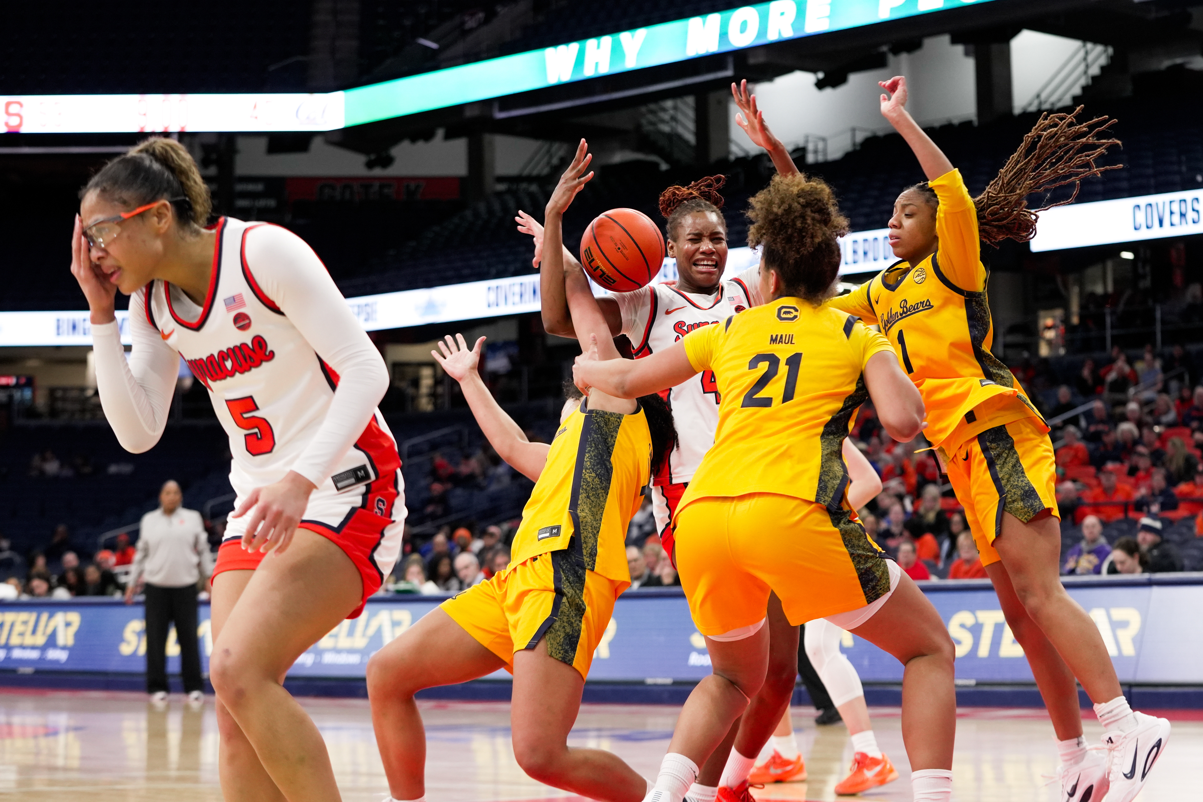 Syracuse Center Uche Izoje (44) battles for the ball with Cal players (Left to right) Naya Ojukwu (7), Gisella Maul (21), and Mjracle Sheppard (1), while Syracuse guard Laila Phelia (5) deals with an injury to the eye during a women's college basketball game on January 15, 2026, at the JMA Wireless Dome in Syracuse, NY. (Photo by Brody Shuffler/Syracuse Athletics)