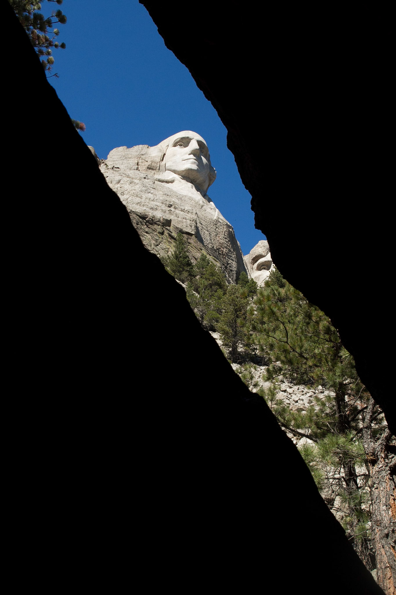 The Mount Rushmore National Memorial is a sculpture carved into the granite face of Mount Rushmore near Keystone, South Dakota, in the United States.