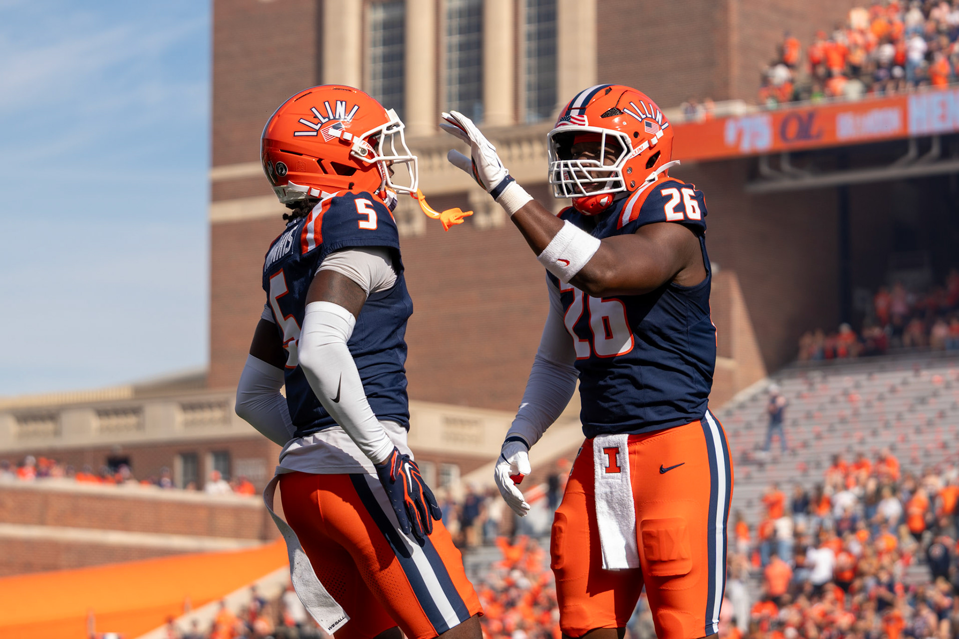 Jakwon Morris, junior defensive back, and Ismael Kante, fifth-year linebacker, exchange a handshake after emerging from the tunnel before Illinois’ game against Oregon at Gies Memorial Stadium on Oct. 24, 2026. The Illini defeated the Ducks 21-10 to improve to 4-3 on the season.