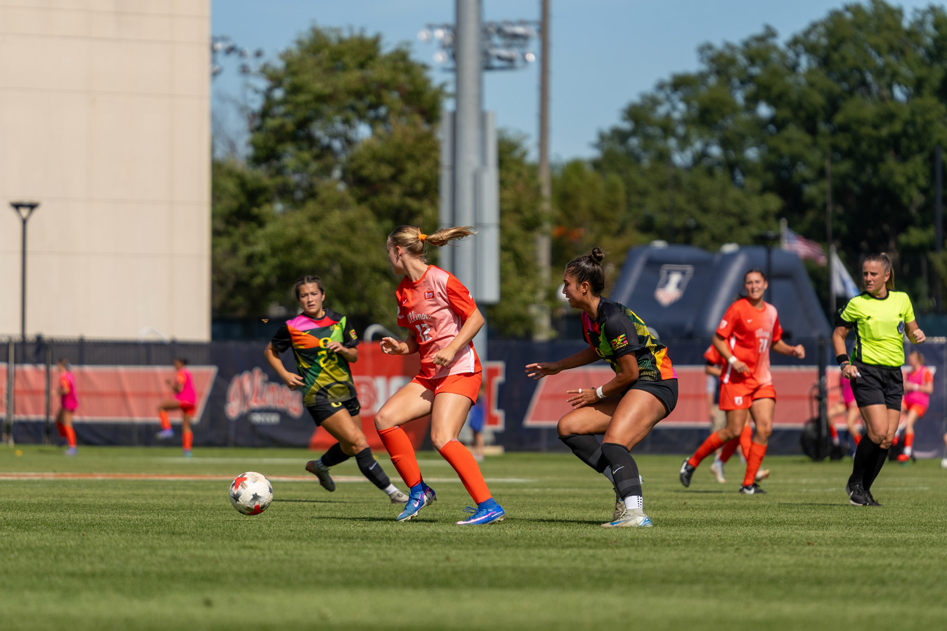 Sophia McMillan, freshman forward/midfielder, gets past Oregon defenders at Demirjian Park on Sunday. Illinois defeated Oregon 2-0 on Senior Night to improve to 4-2-5 overall on the season.