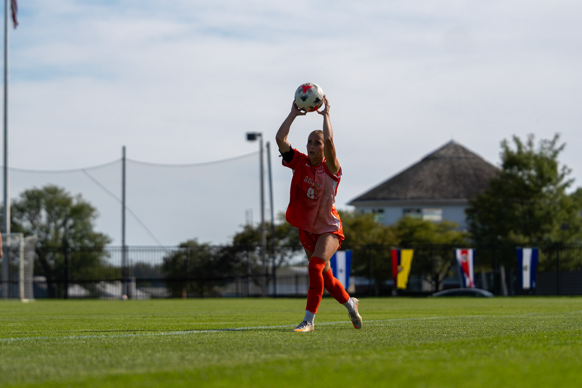 Sutton Webb, fifth-year forward, takes a throw-in during Illinois' 2-0 victory over Oregon at Demirjian Park on Sunday. The Illini outshot the Ducks 9-7 on the afternoon.