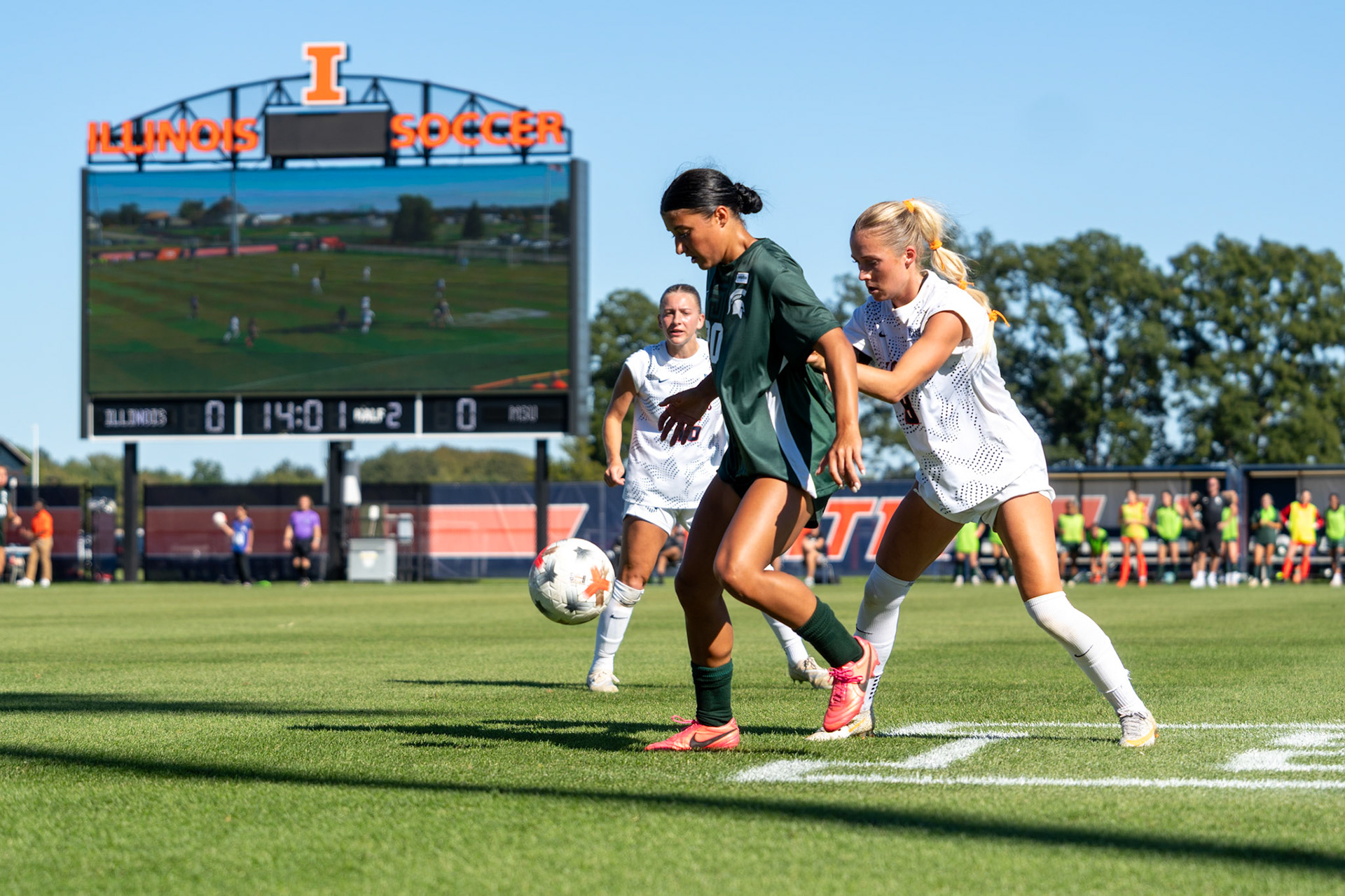 Sutton Webb, fifth-year forward, applies defensive pressure on Michigan State forward Shelby Vaughn at Demirjian Park on Oct. 4, 2026. Illinois fell 1-0 to No. 2 Michigan State after a late goal in the 85th minute.
