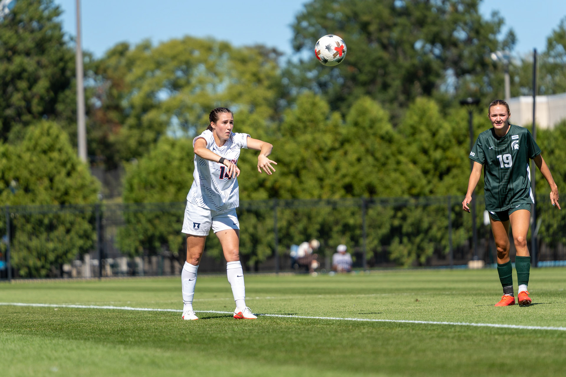 Bella Zanoni, junior defender, takes a throw-in against No. 2 Michigan State at Demirjian Park on Oct. 4, 2026. Illinois fell 1-0 to the Spartans after a late goal in the 85th minute.