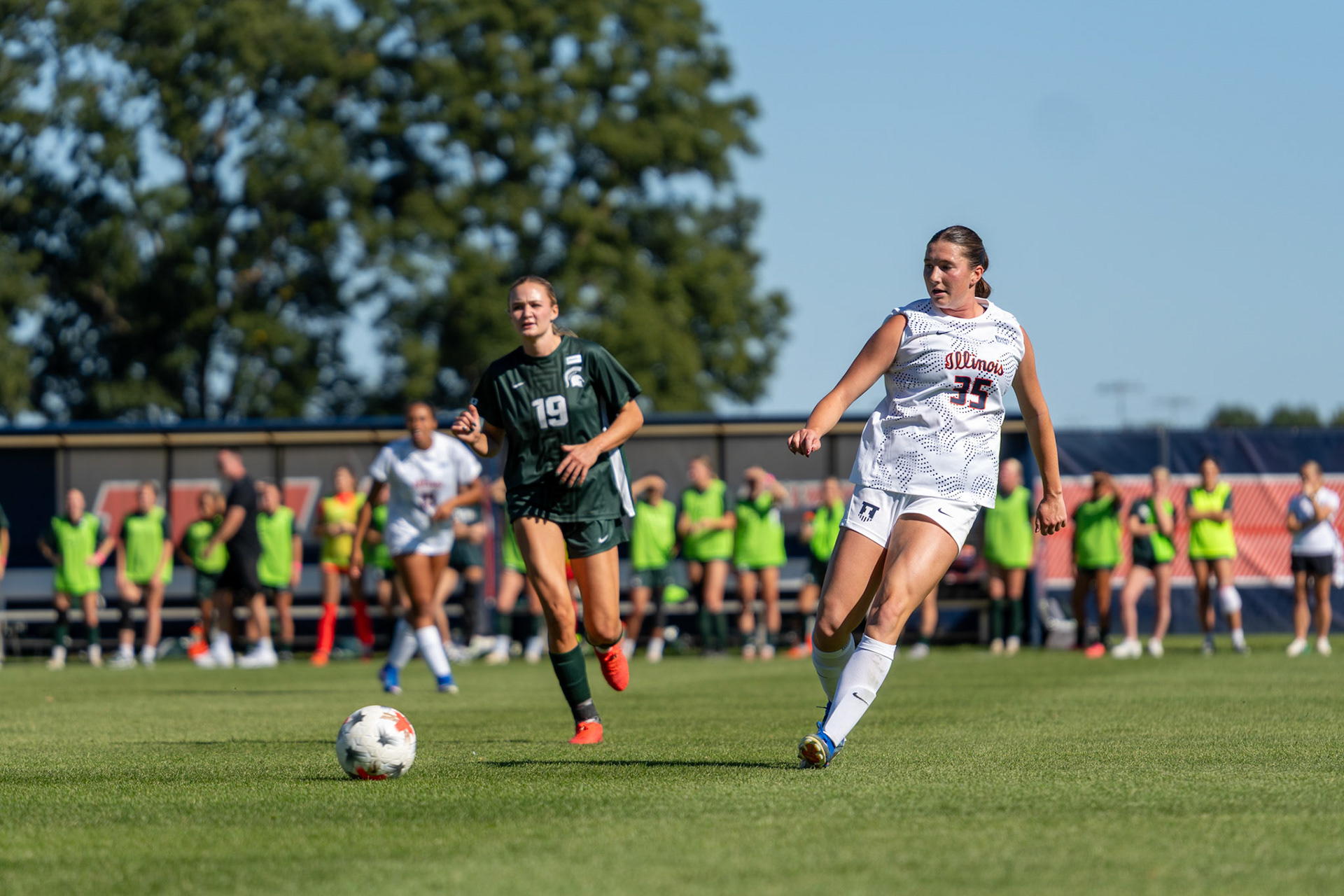 Kylie Marschall, senior defender, plays the ball past Michigan State midfielder Emerson Sargeant at Demirjian Park on Oct. 4, 2026. Illinois fell 1-0 to No. 2 Michigan State after a late goal in the 85th minute.